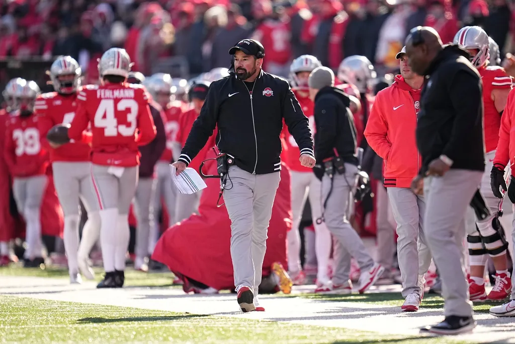 Ohio State Buckeyes head coach Ryan Day walks the sideline during the second half of the NCAA football game against the Michigan Wolverines at Ohio Stadium in Columbus on Saturday, Nov. 30, 2024.