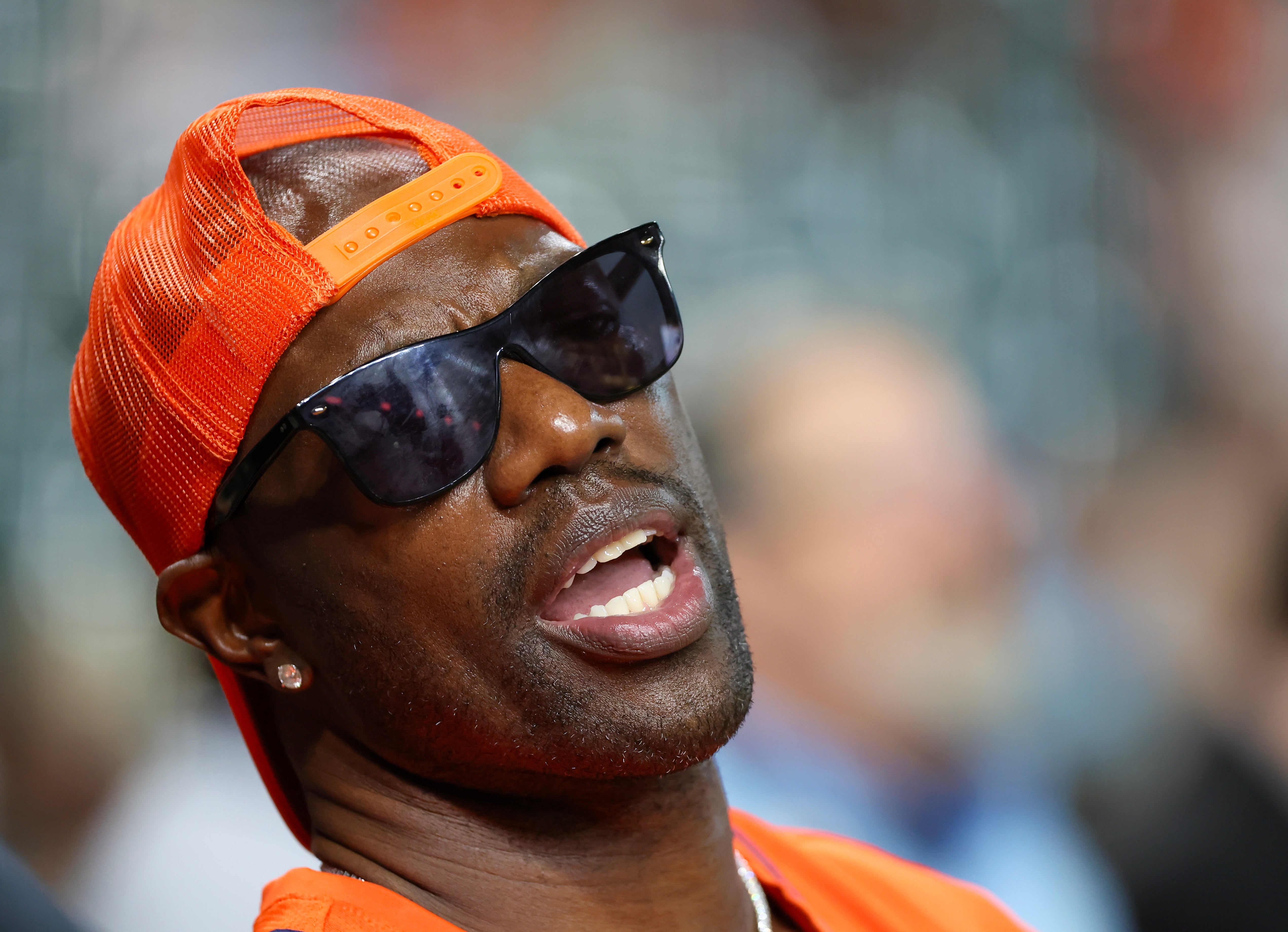 Sep 24, 2024; Houston, Texas, USA; Hall of Fame Terrell Owens watches the first pitch before the Seattle Mariners play against the Houston Astros at Minute Maid Park.