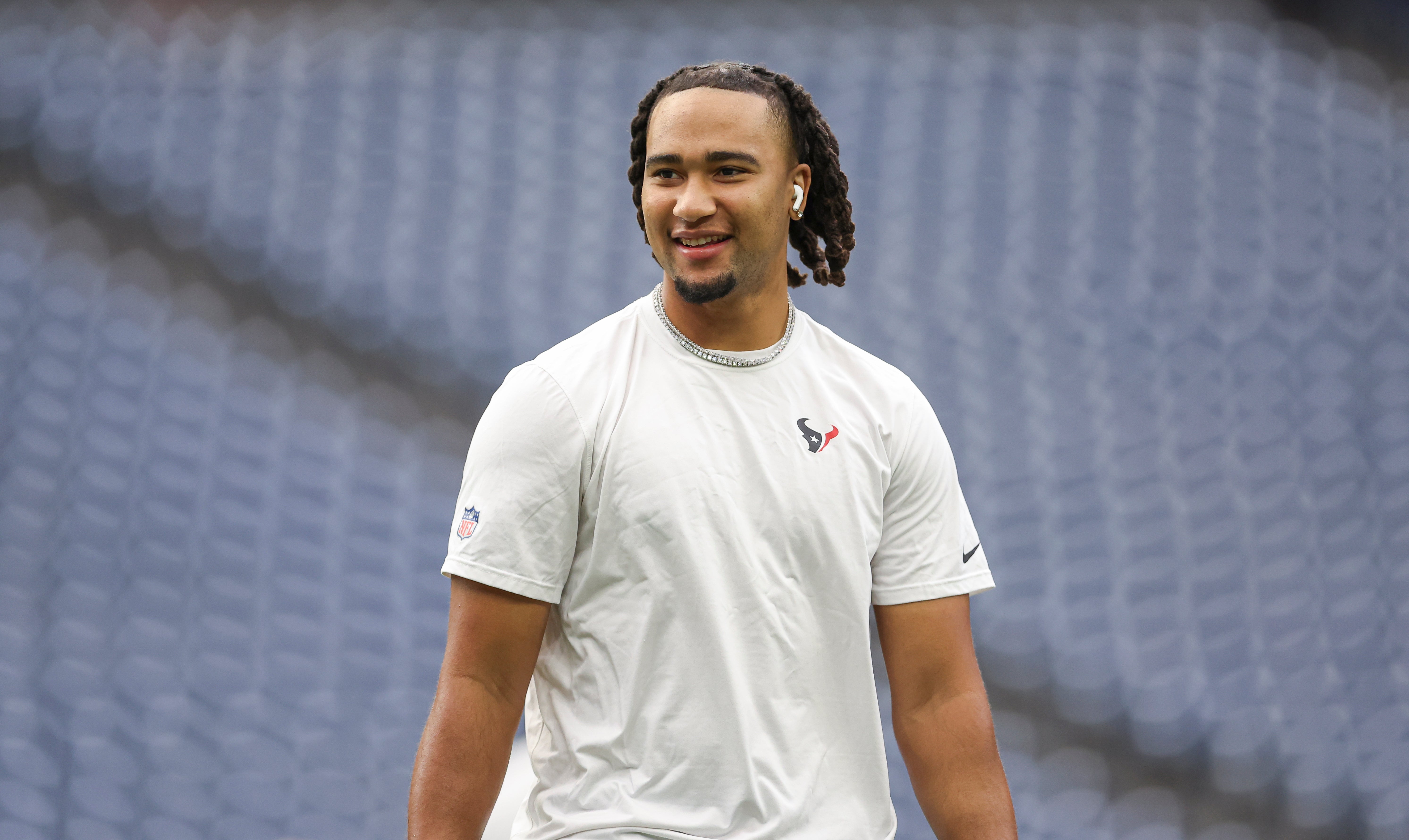 Aug 17, 2024; Houston, Texas, USA; Houston Texans quarterback C.J. Stroud (7) smiles before the game against the New York Giants at NRG Stadium.