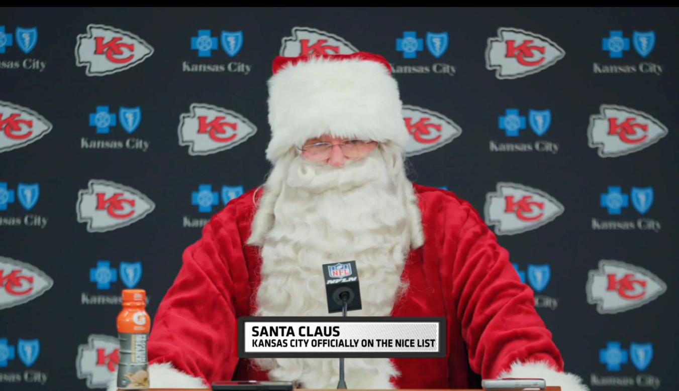 Chiefs HC Andy Reid dressed as Santa Claus.