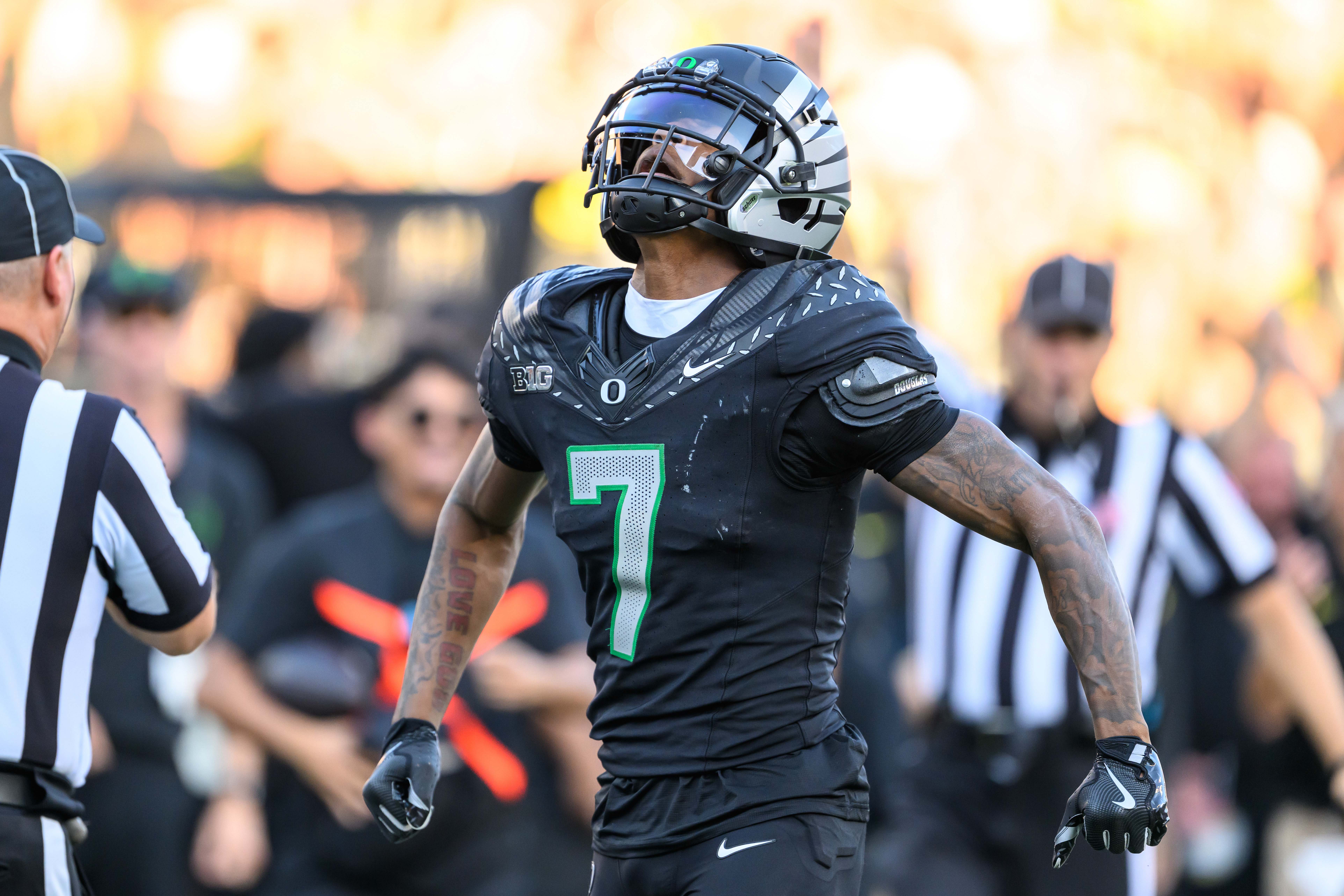 Oct 12, 2024; Eugene, Oregon, USA; Oregon Ducks wide receiver Evan Stewart (7) celebrates a catch during the second quarter against the Ohio State Buckeyes at Autzen Stadium.