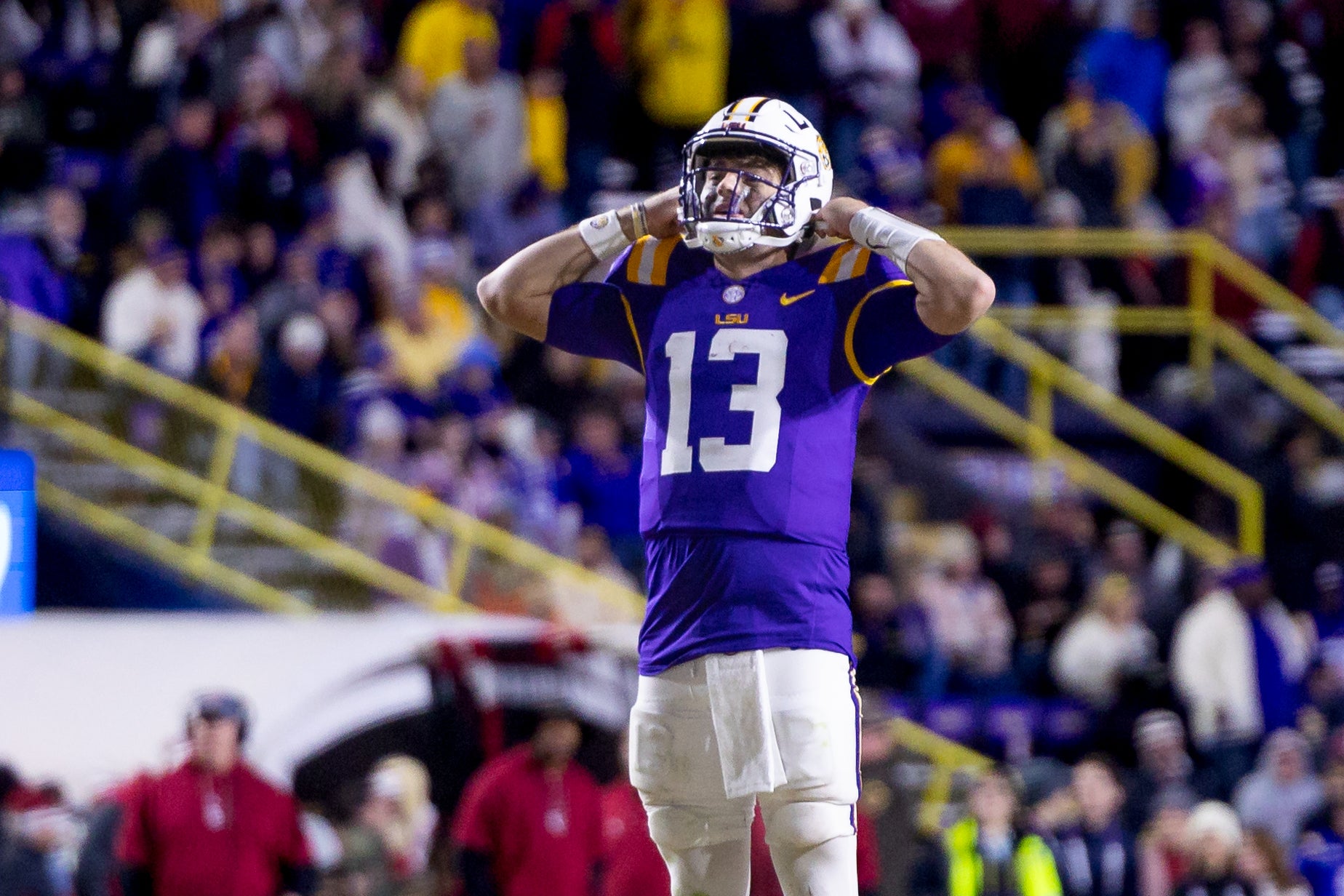Nov 30, 2024; Baton Rouge, Louisiana, USA; LSU Tigers quarterback Garrett Nussmeier (13) reacts to missing a pass against the Oklahoma Sooners during the fourth quarter at Tiger Stadium. Mandatory Credit: Stephen Lew-Imagn Images  