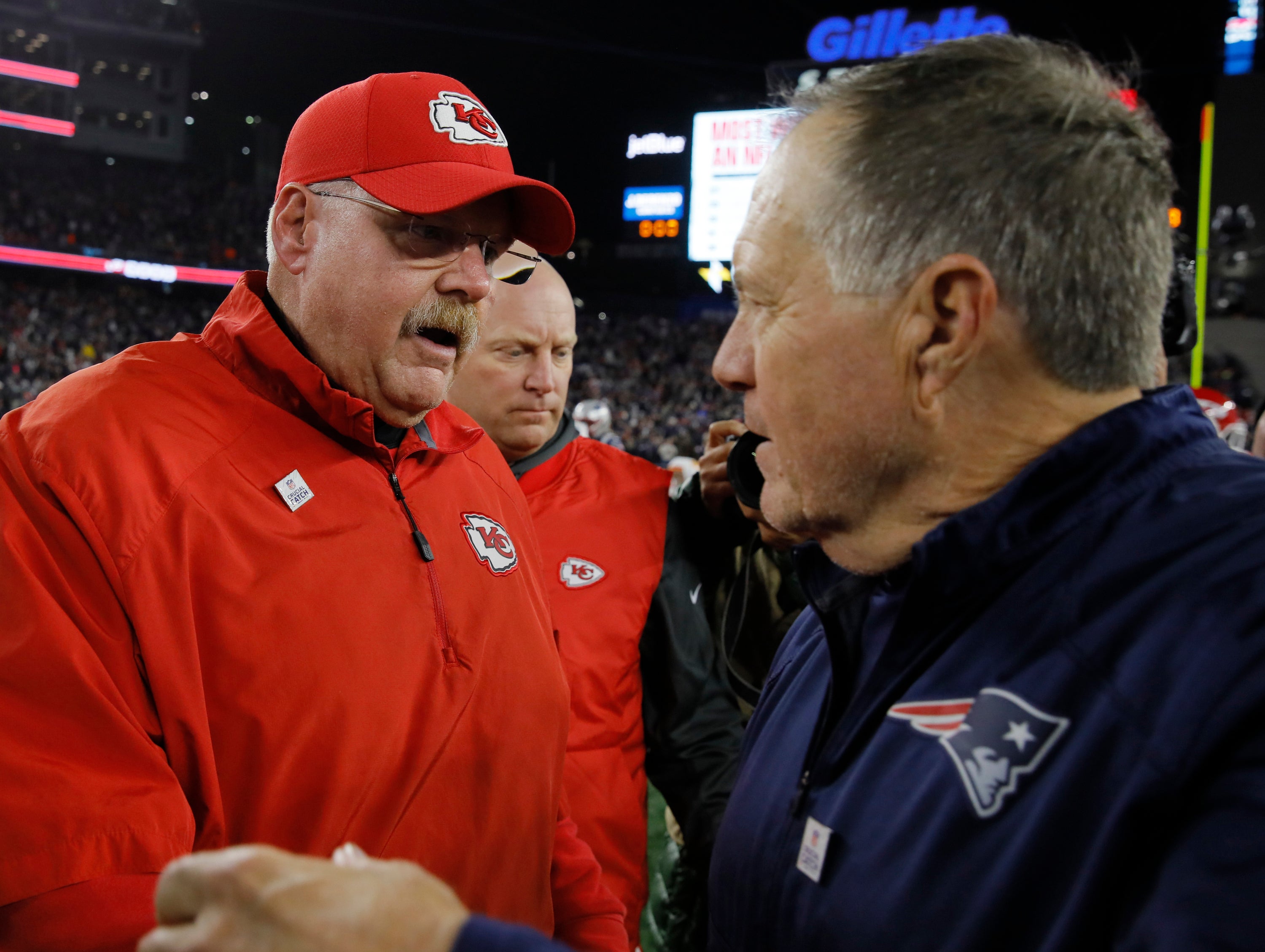 Oct 14, 2018; Foxborough, MA, USA; Kansas City Chiefs head coach Andy Reid meets New England Patriots head coach Bill Belichick after the game at Gillette Stadium. The Patriots defeated Kansas City 43-40.