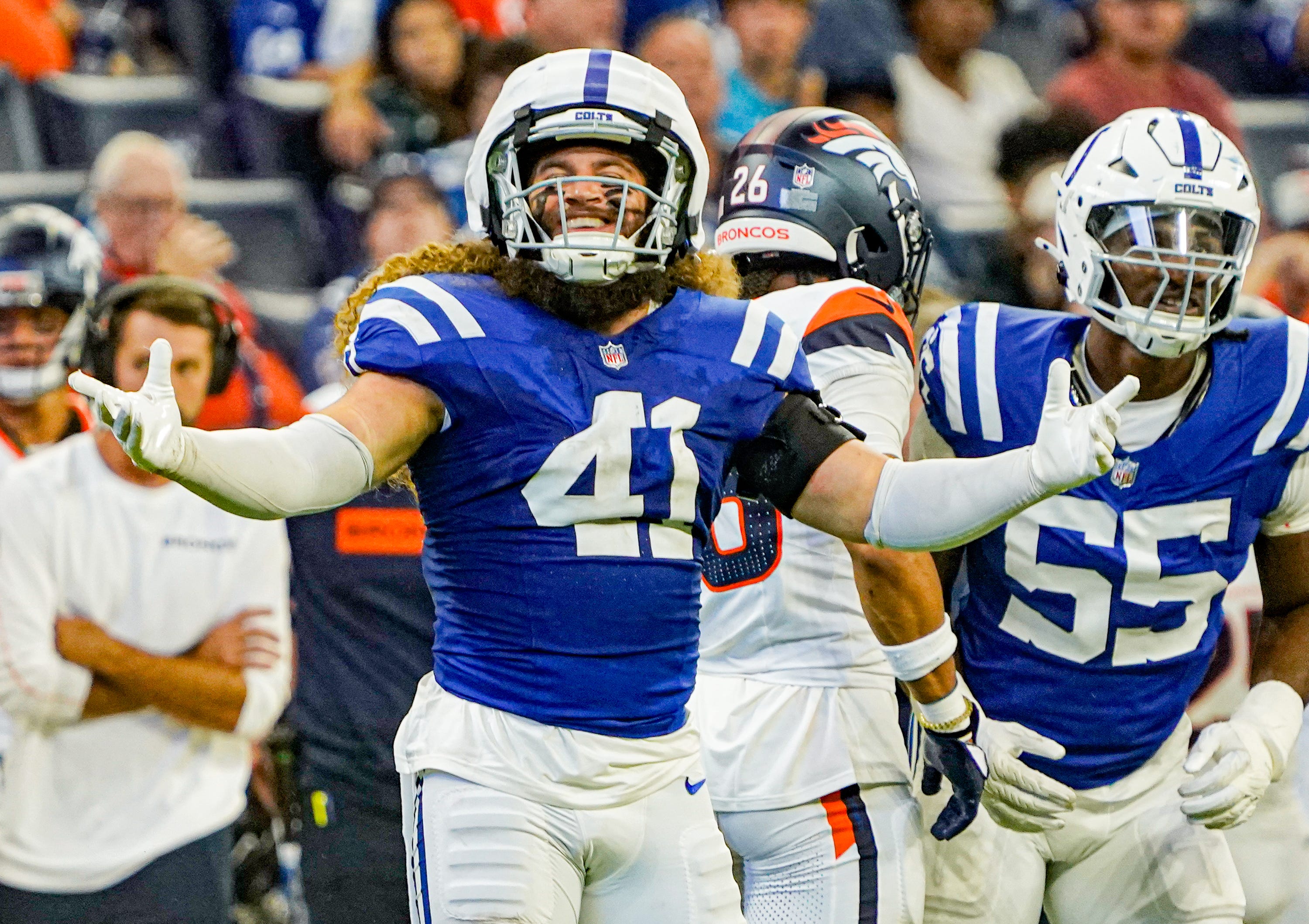 Indianapolis Colts linebacker Grant Stuard (41) celebrates a play during a pre-season game between the Indianapolis Colts and the Denver Broncos on Sunday, August. 11, 2024 at Lucas Oil Stadium in Indianapolis.