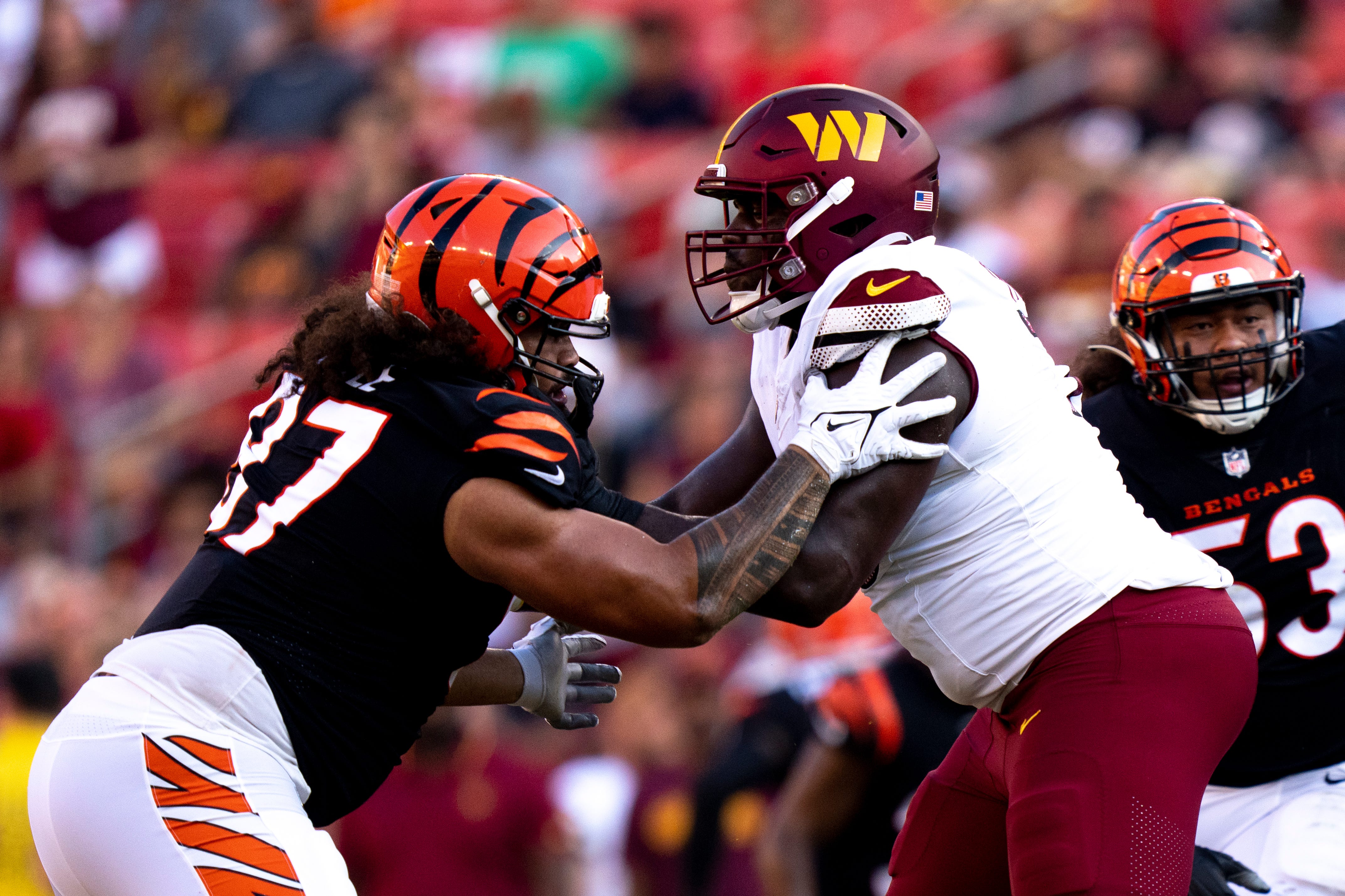 Cincinnati Bengals defensive tackle Jay Tufele (97) blocks Washington Commanders guard Braeden Daniels (79) during the NFL preseason week 3 game between the Cincinnati Bengals and the Washington Commanders at FedEx Field in Landover, M.D
