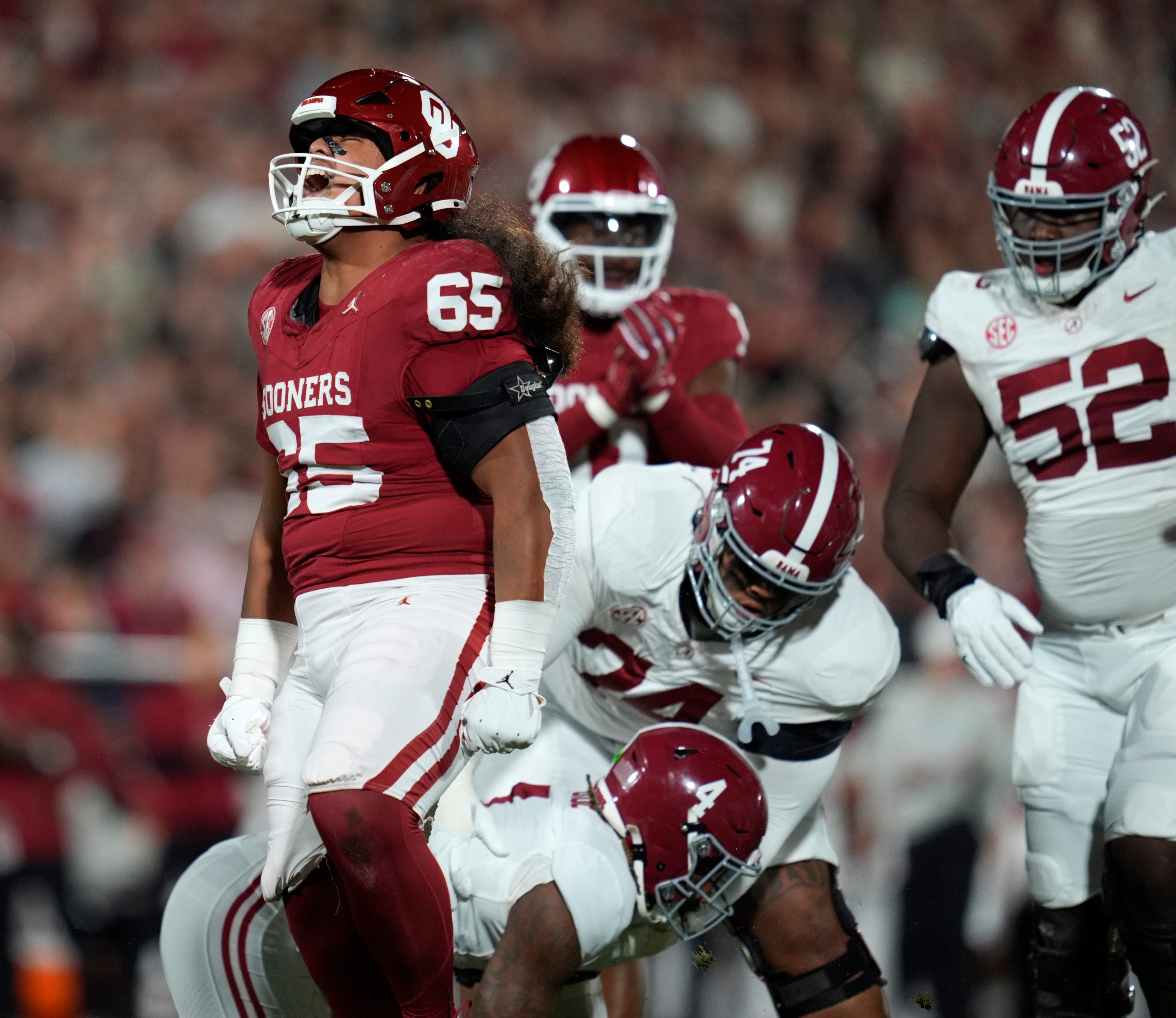 Oklahoma Sooners defensive lineman Jayden Jackson (65) celebrates during a college football game between the University of Oklahoma Sooners (OU) and the Alabama Crimson Tide at Gaylord Family - Oklahoma Memorial Stadium in Norman, Okla., Saturday, Nov. 23, 2024.