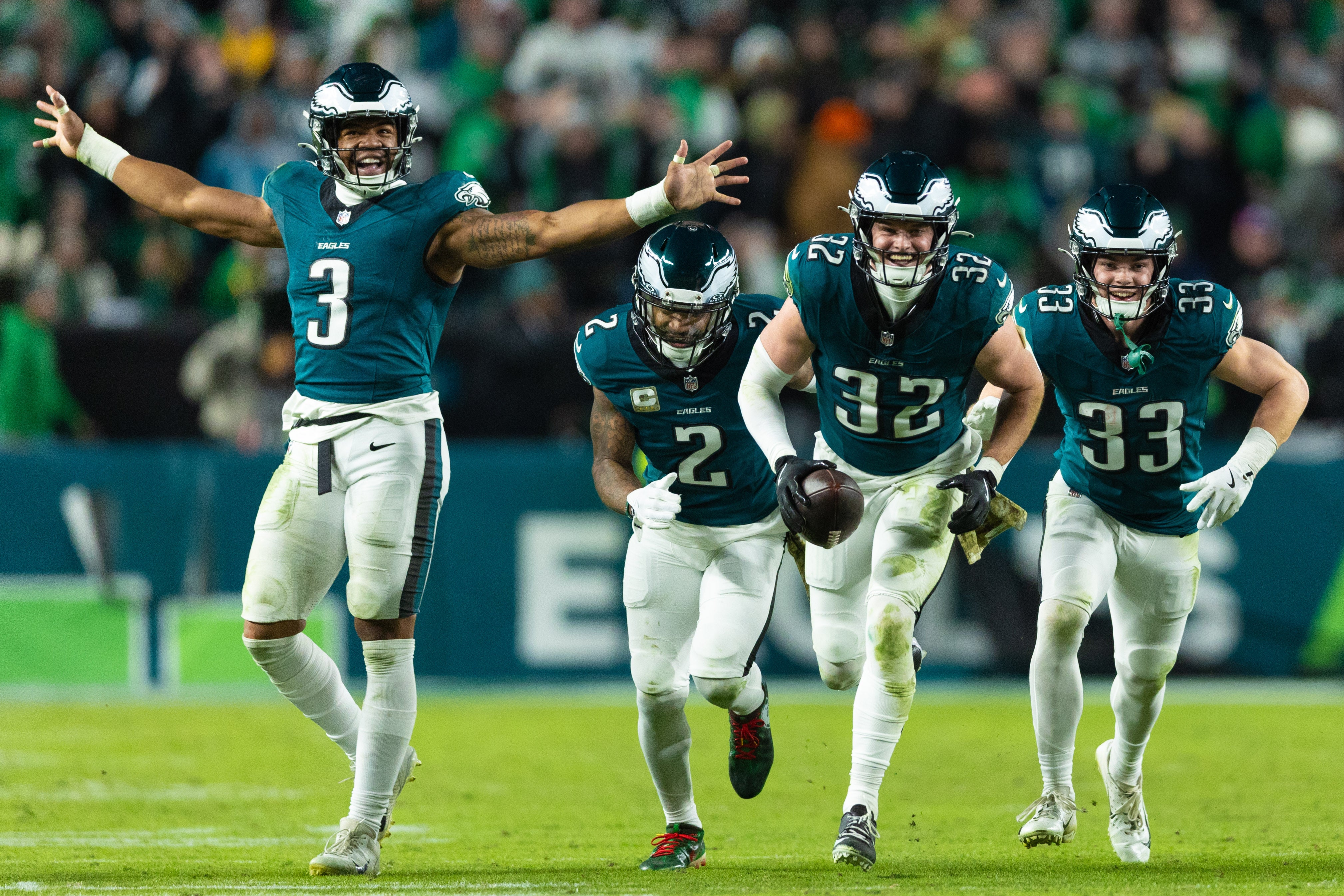 Philadelphia Eagles safety Reed Blankenship (32) celebrates with teammates after his interception during the fourth quarter against the Washington Commanders at Lincoln Financial Field.