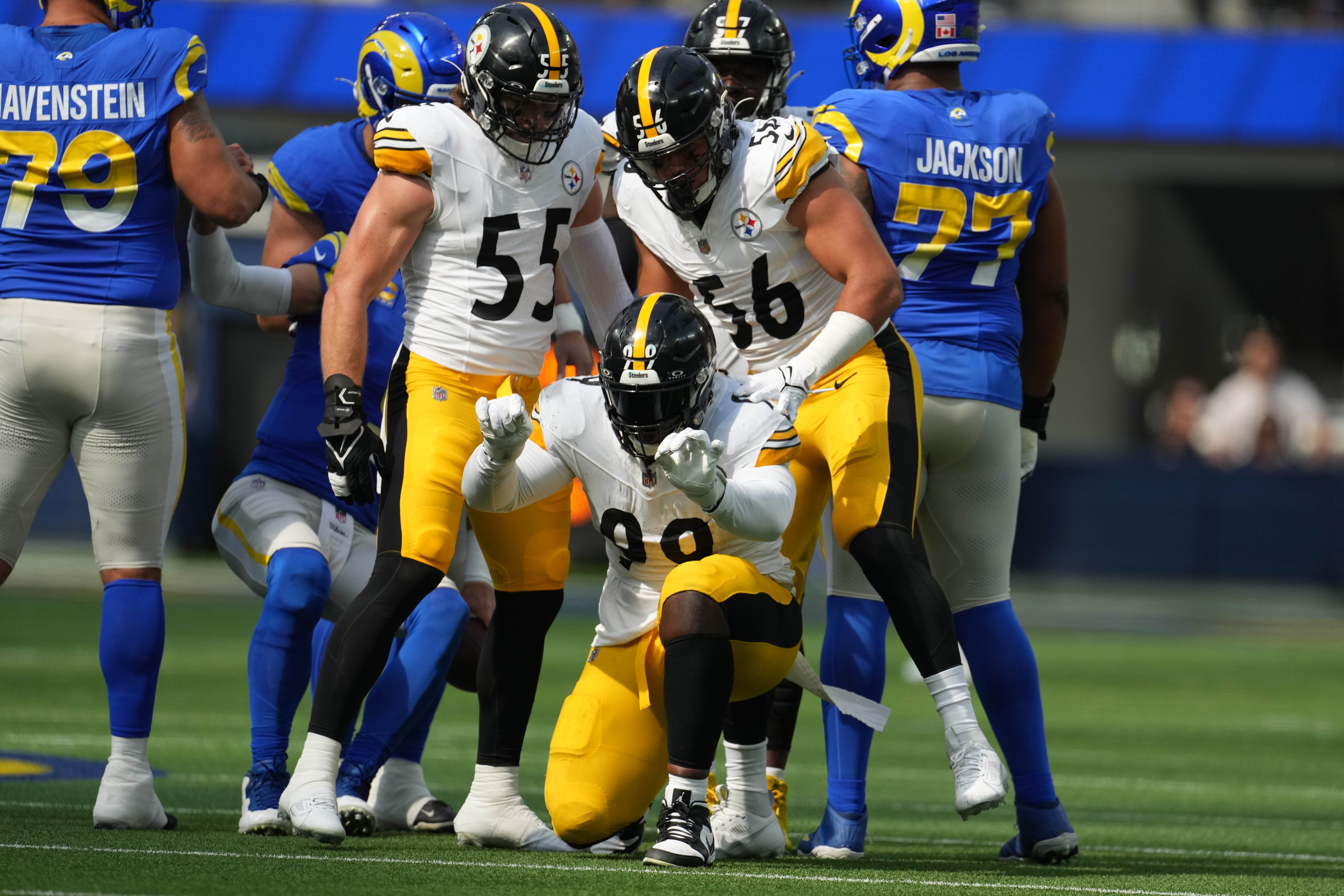 Oct 22, 2023; Inglewood, California, USA; Pittsburgh Steelers defensive tackle Larry Ogunjobi (99) celebrates with linebacker Cole Holcomb (55) and linebacker Alex Highsmith (56) in the first half at SoFi Stadium.