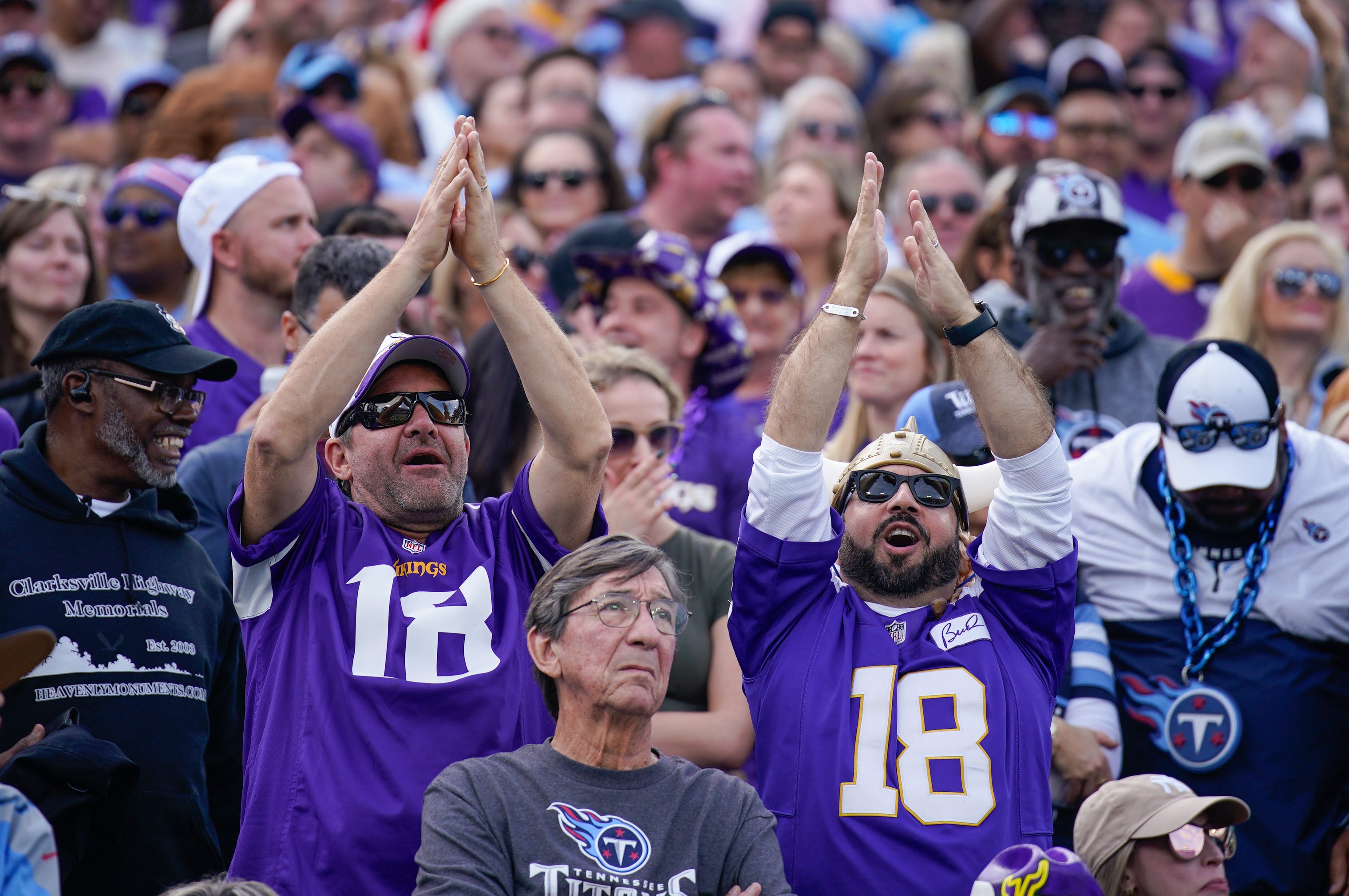 Minnesota Vikings fans celebrate an end zone penalty call against the Tennessee Titans during the second quarter at Nissan Stadium in Nashville, Tenn., Sunday, Nov. 17, 2024.