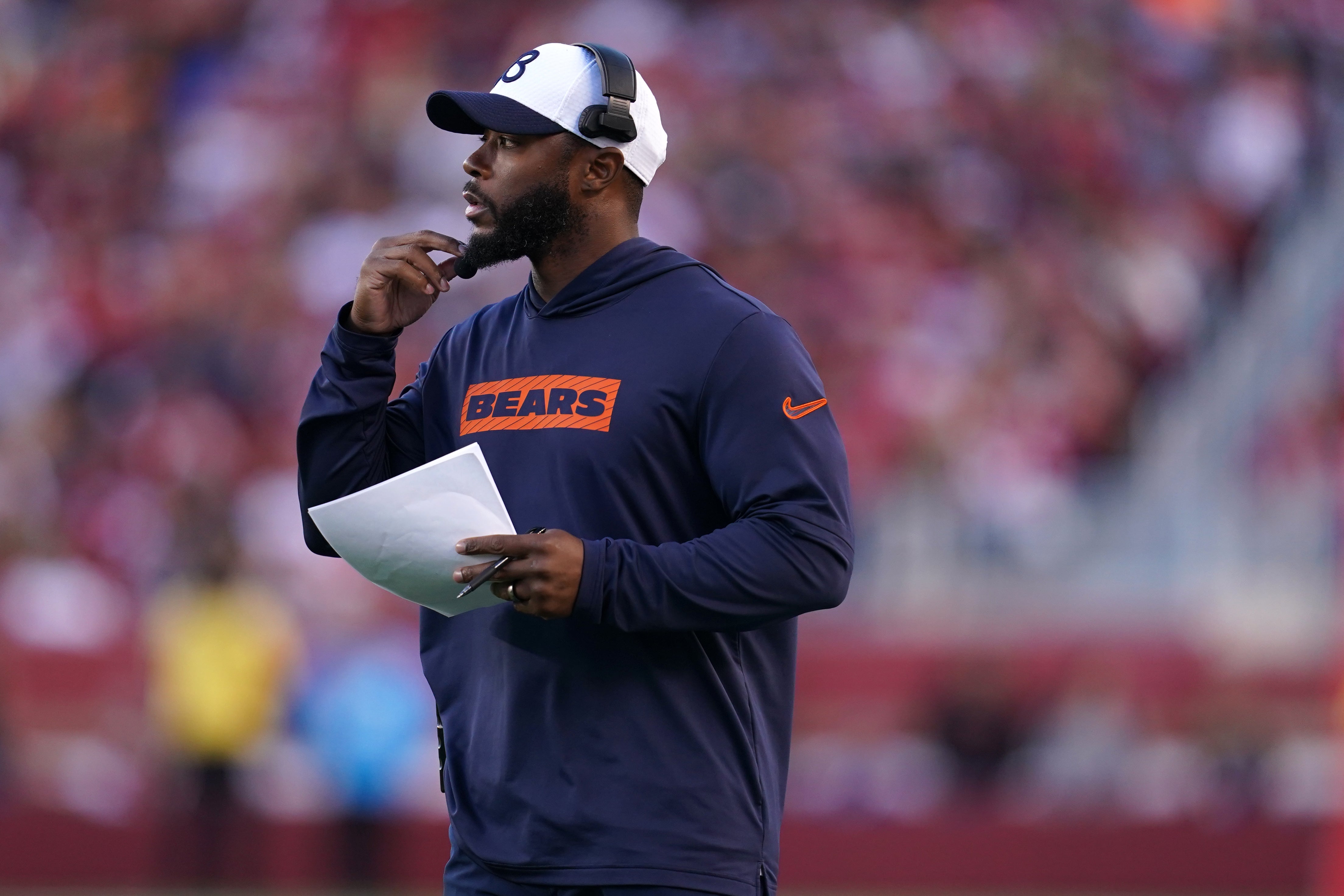 Dec 8, 2024; Santa Clara, California, USA; Chicago Bears interim head coach Thomas Brown stands on the field after calling a timeout against the San Francisco 49ers in the fourth quarter at Levi's Stadium.