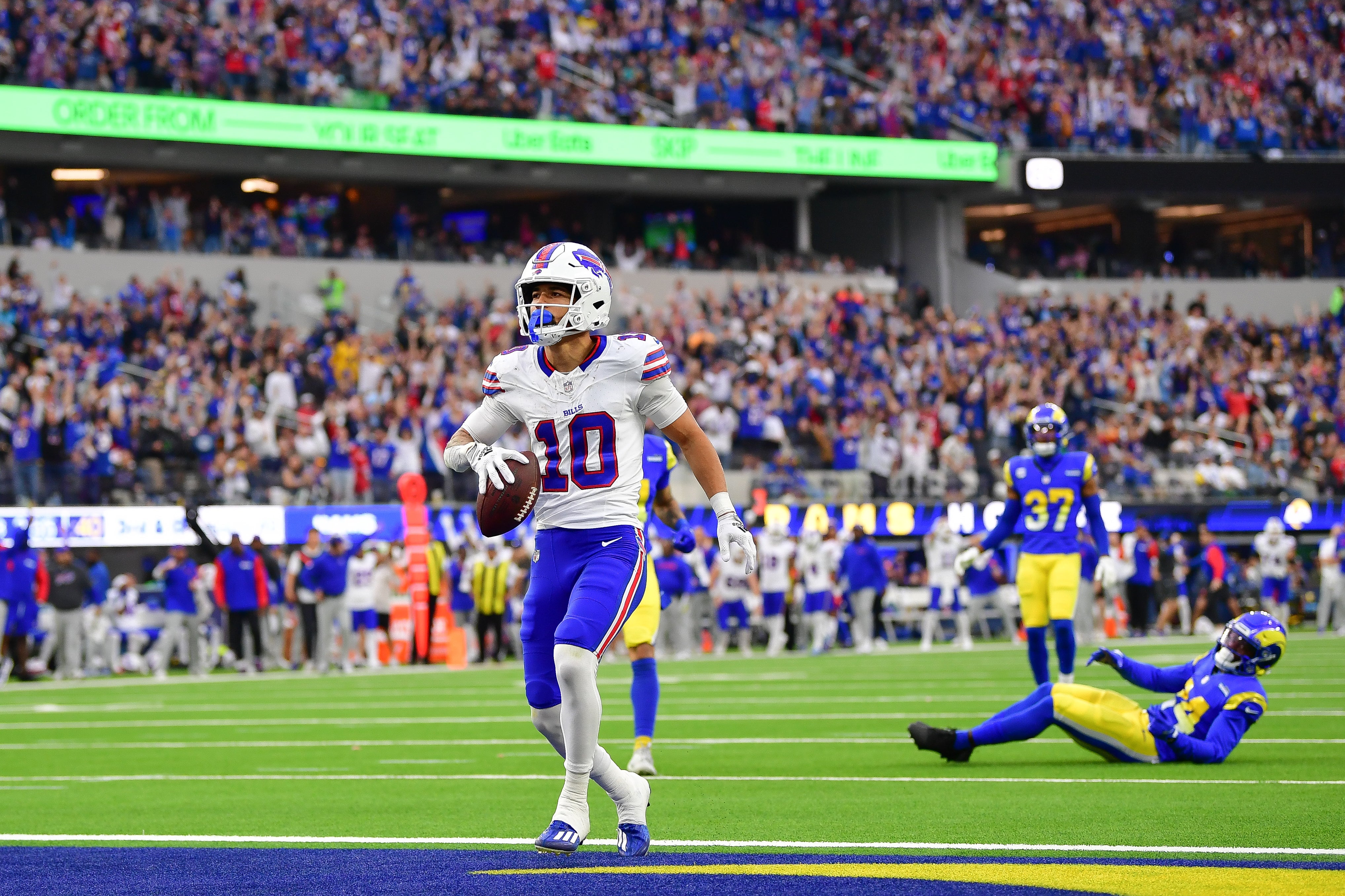 Bills wide receiver Khalil Shakir (10) scores a touchdown against the Rams