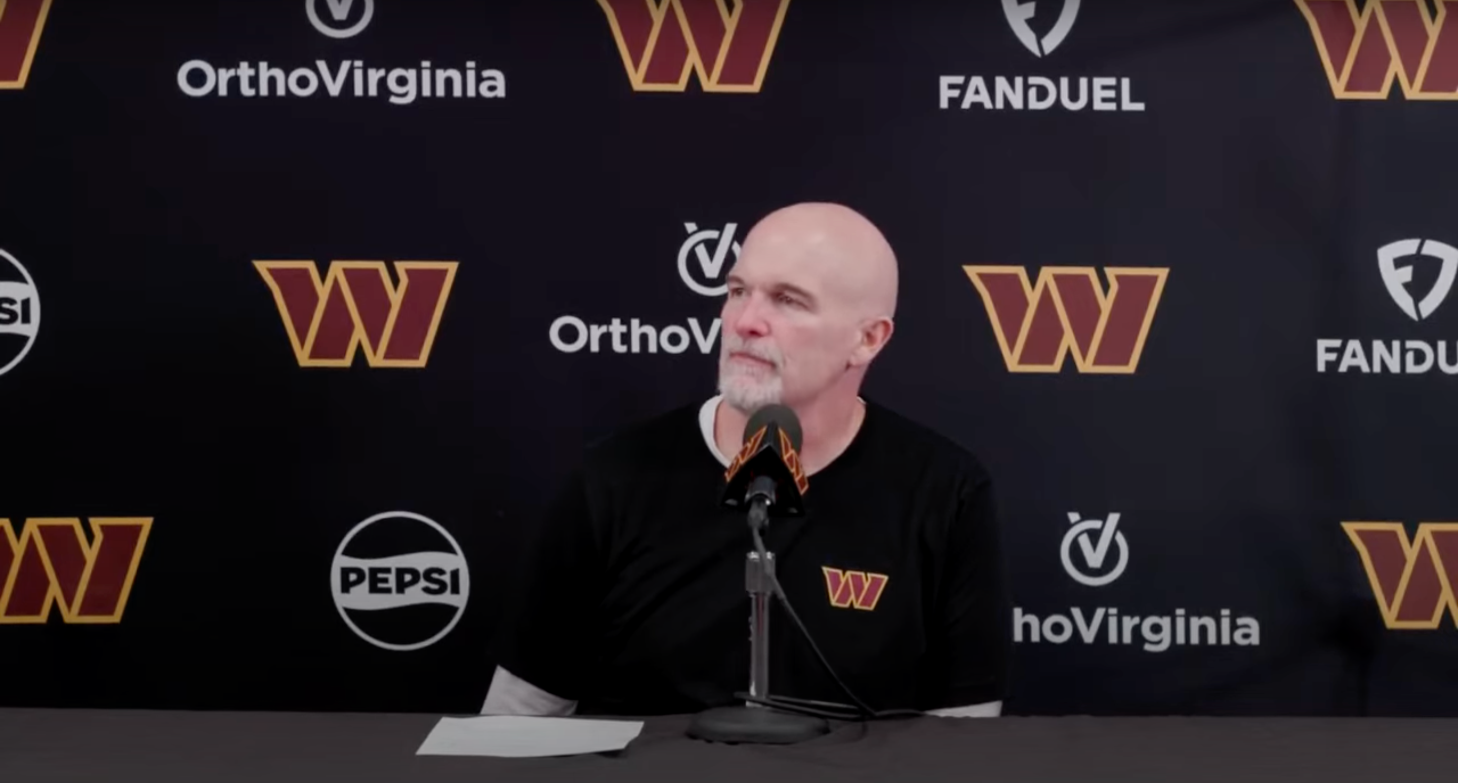 Dan Quinn talks to reporters on Friday before the Commanders' Week 15 game against the Saints.