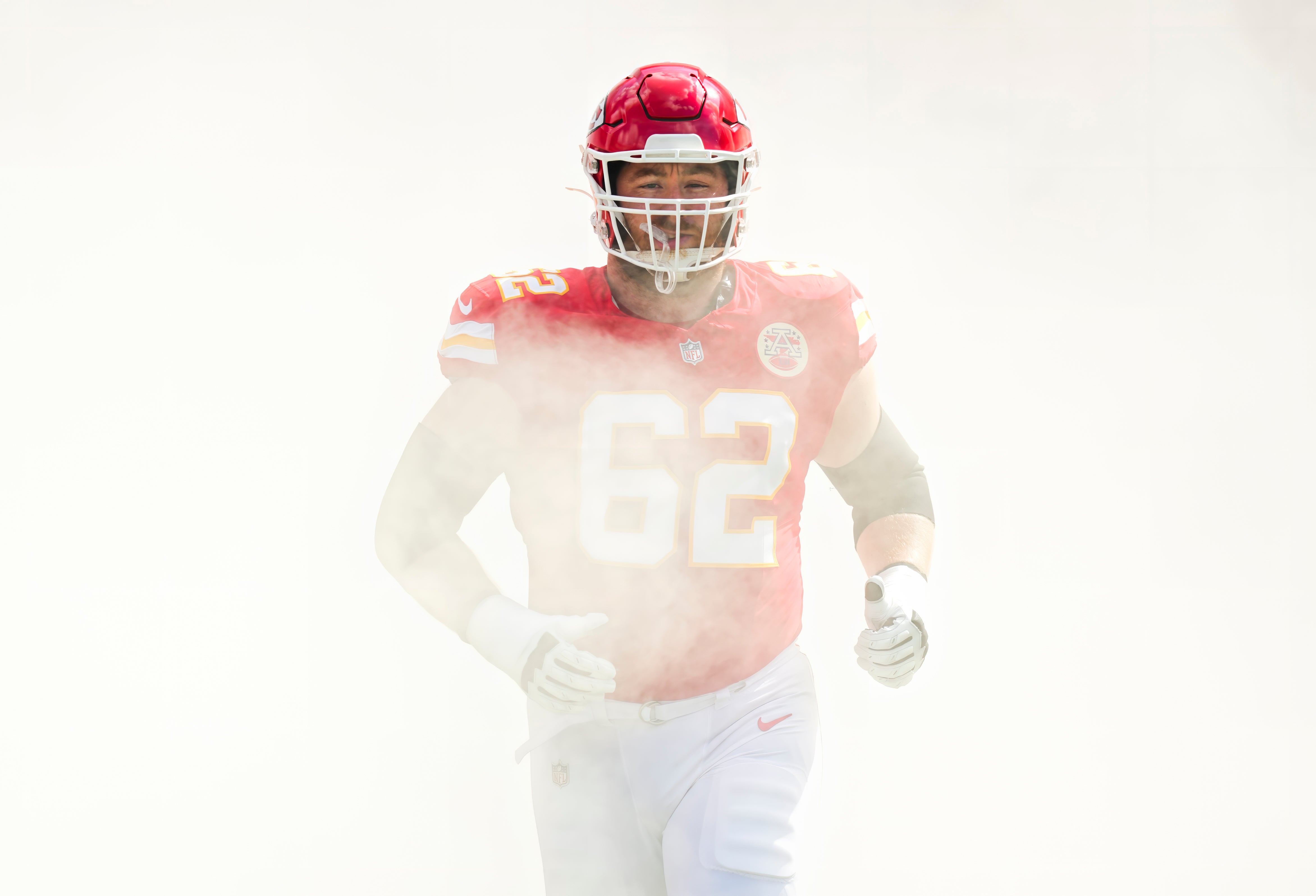 Sep 15, 2024; Kansas City, Missouri, USA; Kansas City Chiefs guard Joe Thuney (62) takes the field prior to a game against the Cincinnati Bengals at GEHA Field at Arrowhead Stadium.