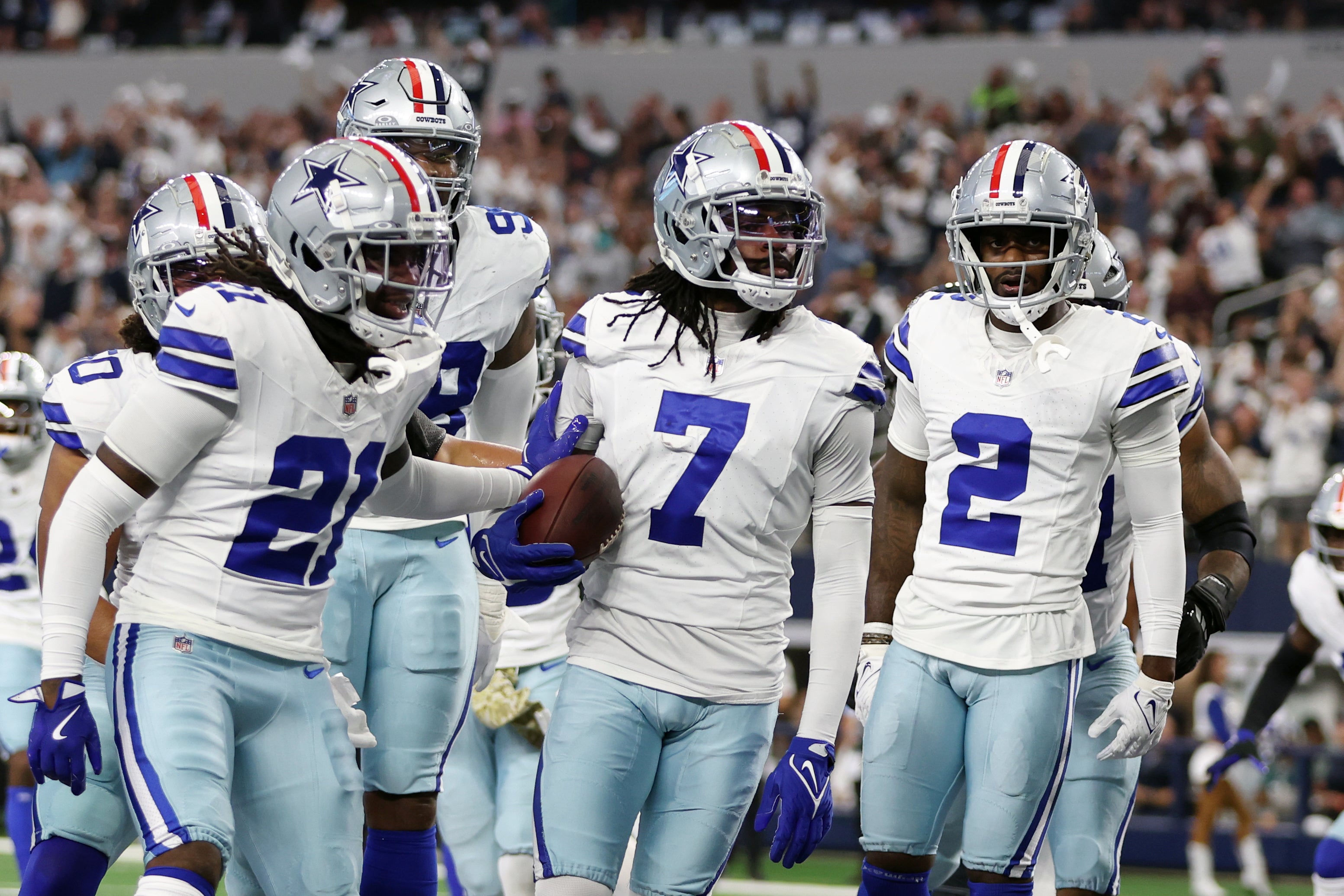 Dallas Cowboys cornerback Trevon Diggs (7) and his teammates react after an interception in the second quarter against the Philadelphia Eagles at AT&T Stadium.