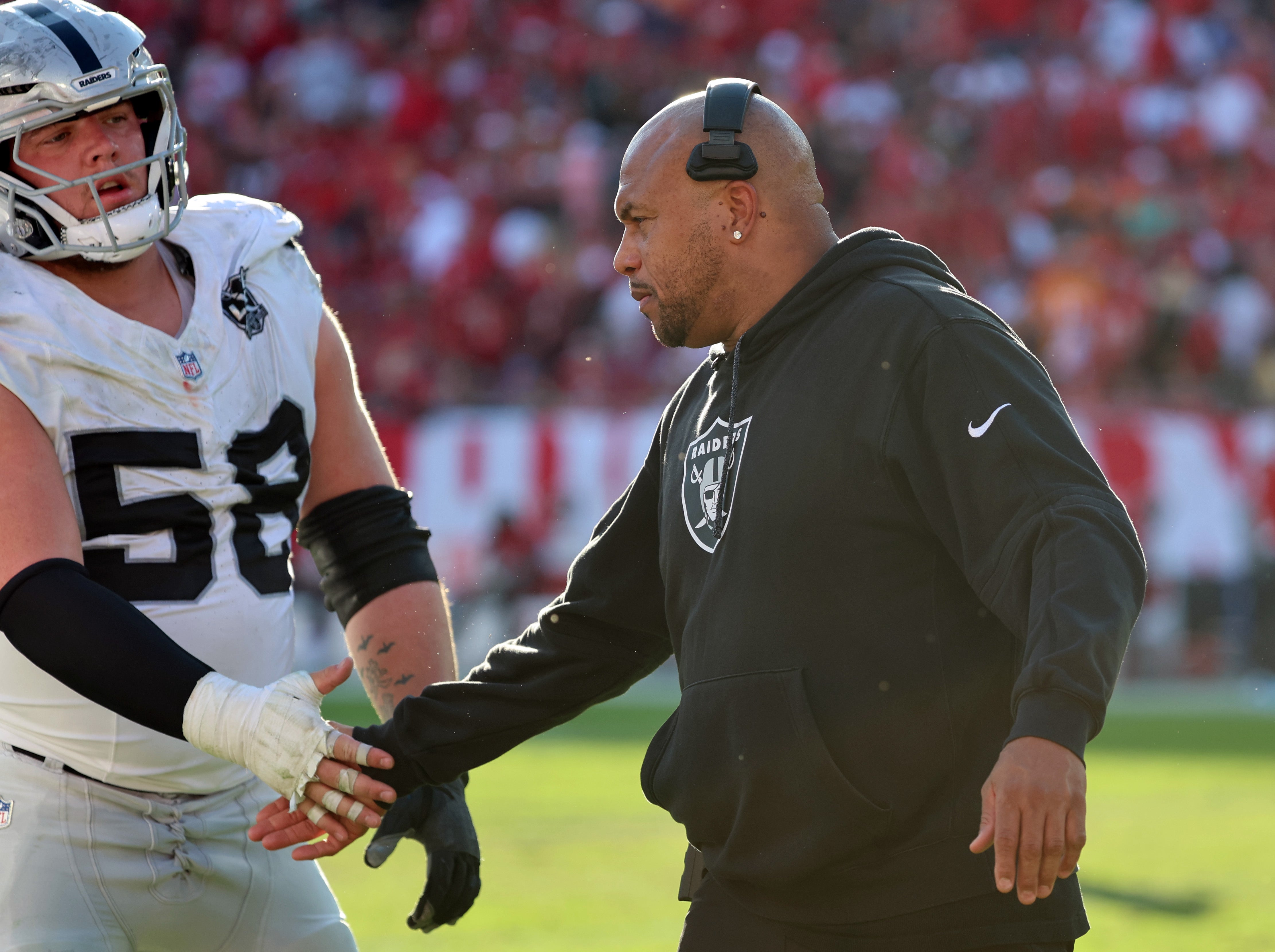 Las Vegas Raiders head coach Antonio Pierce Jackson Powers-Johnson