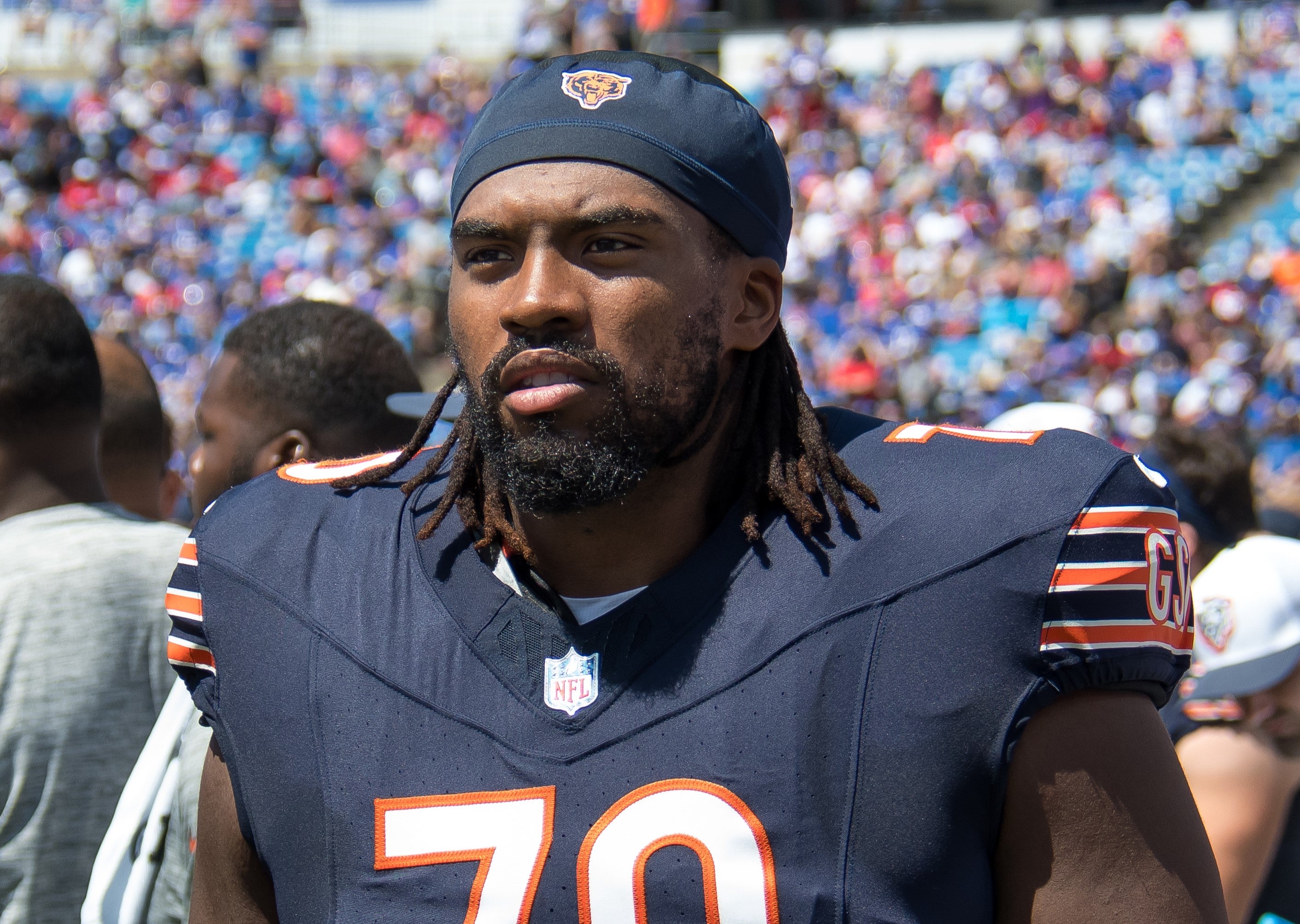 Aug 10, 2024; Orchard Park, New York, USA; Chicago Bears offensive tackle Braxton Jones (70) on the sidelines during a pre-season game against the Buffalo Bills at Highmark Stadium.