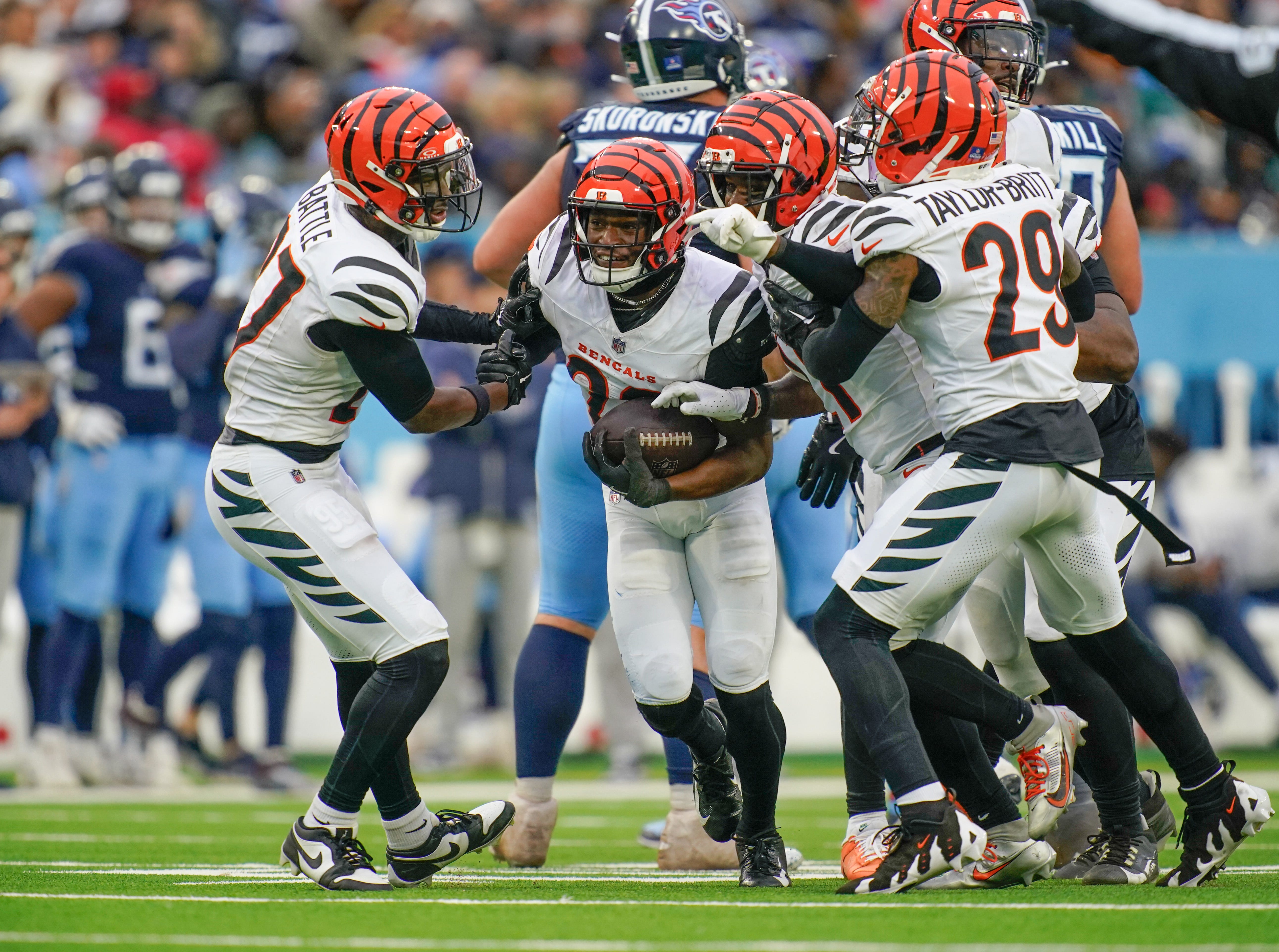 Cincinnati Bengals cornerback Josh Newton (28) celebrates after intercepting a Tennessee Titans pass during the fourth quarter at Nissan Stadium in Nashville, Tenn., Sunday, Dec. 15, 2024.  