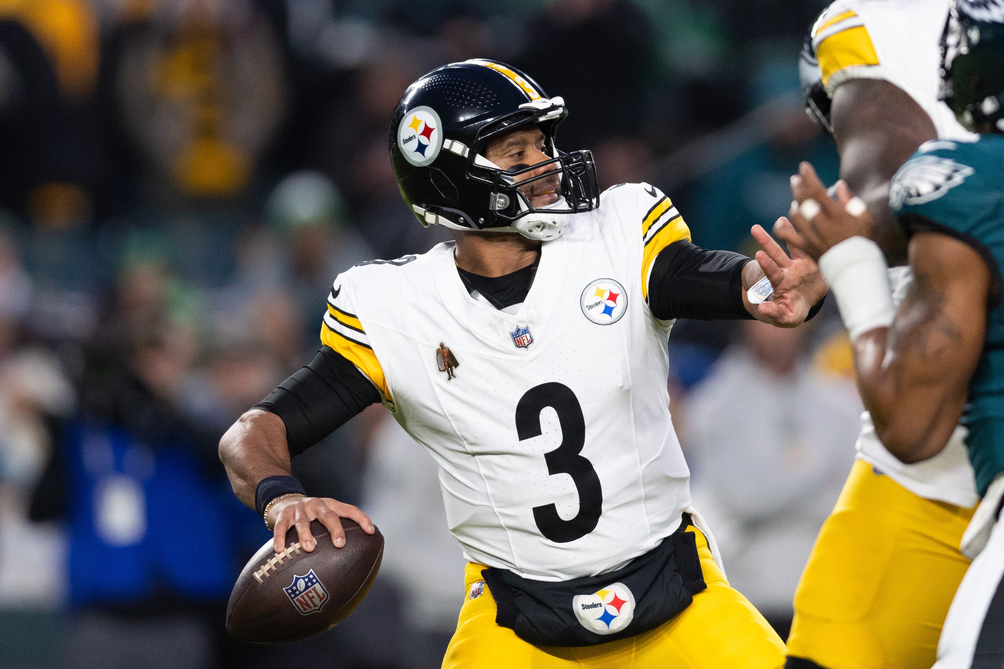 Dec 15, 2024; Philadelphia, Pennsylvania, USA; Pittsburgh Steelers quarterback Russell Wilson (3) throws the ball against the Philadelphia Eagles during the first quarter at Lincoln Financial Field.