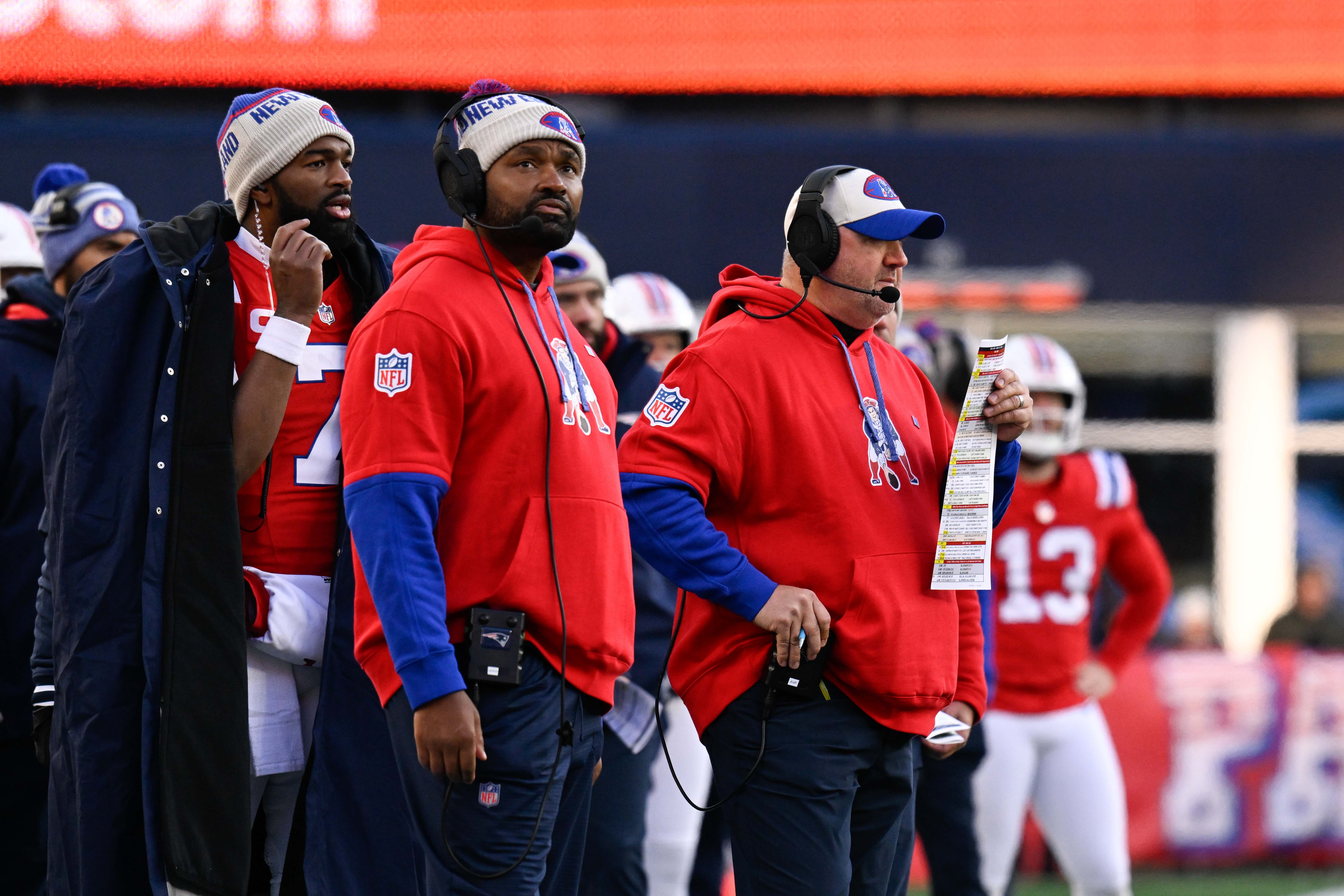 Dec 1, 2024; Foxborough, Massachusetts, USA; New England Patriots quarterback Jacoby Brissett (7), head coach Jerod Mayo, and offensive coordinator Alex Van Pelt (L to R) watch from the sideline during the second half against the Indianapolis Colts at Gillette Stadium.