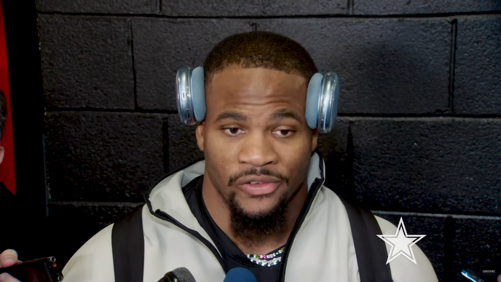 Dallas Cowboys DE Micah Parsons talks to reporters following win over Carolina Panthers.