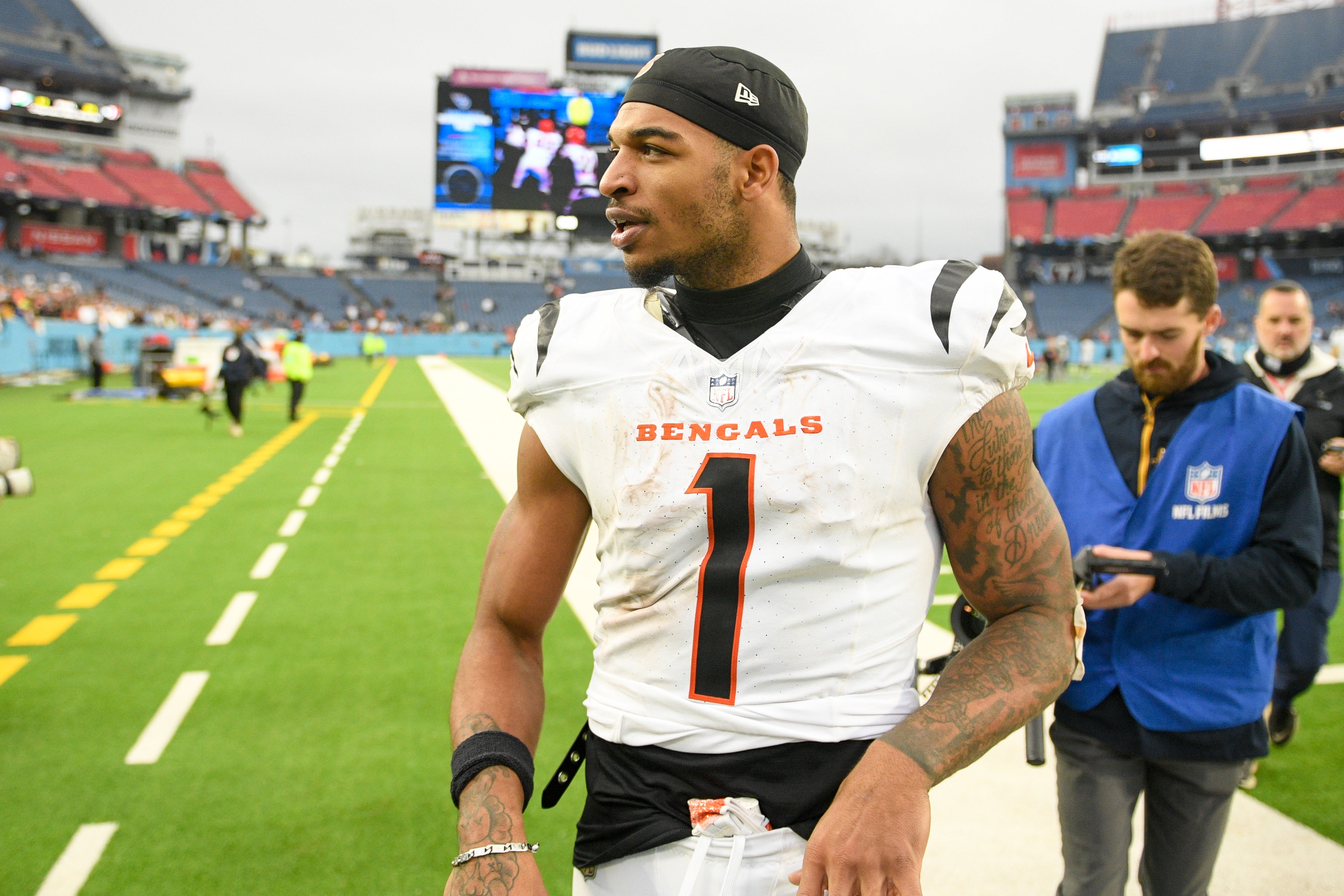 Dec 15, 2024; Nashville, Tennessee, USA; post game at Nissan Stadium. Mandatory Credit: Steve RCincinnati Bengals wide receiver Ja'Marr Chase (1) walks off the field against the Tennessee Titans.
