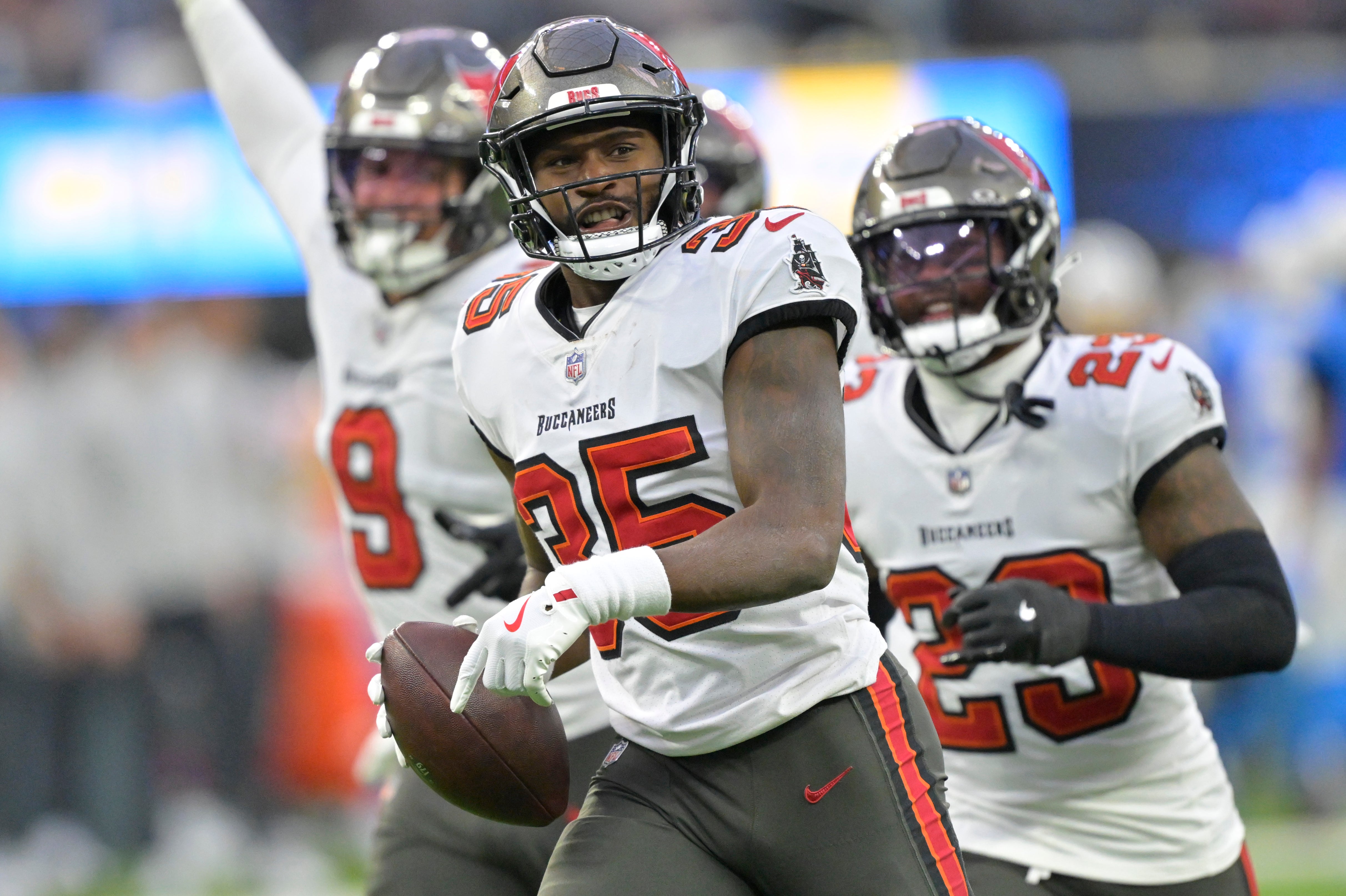 Dec 15, 2024; Inglewood, California, USA; Tampa Bay Buccaneers cornerback Jamel Dean (35) celebrates after a fumble recovery in the second half against the Los Angeles Chargers at SoFi Stadium.