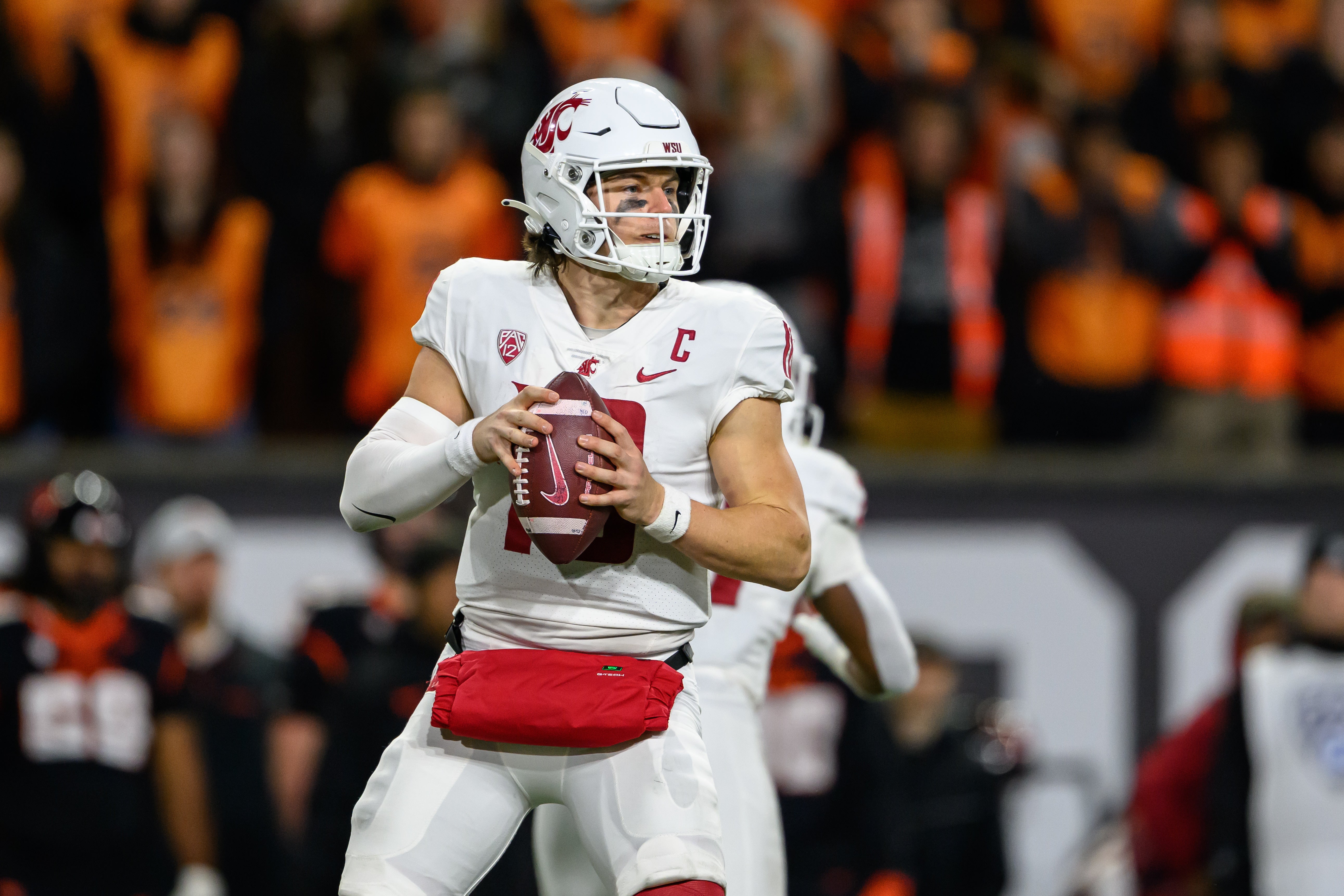 Nov 23, 2024; Corvallis, Oregon, USA; Washington State Cougars quarterback John Mateer (10) sets up to pass during the third quarter against the Oregon State Beavers at Reser Stadium.