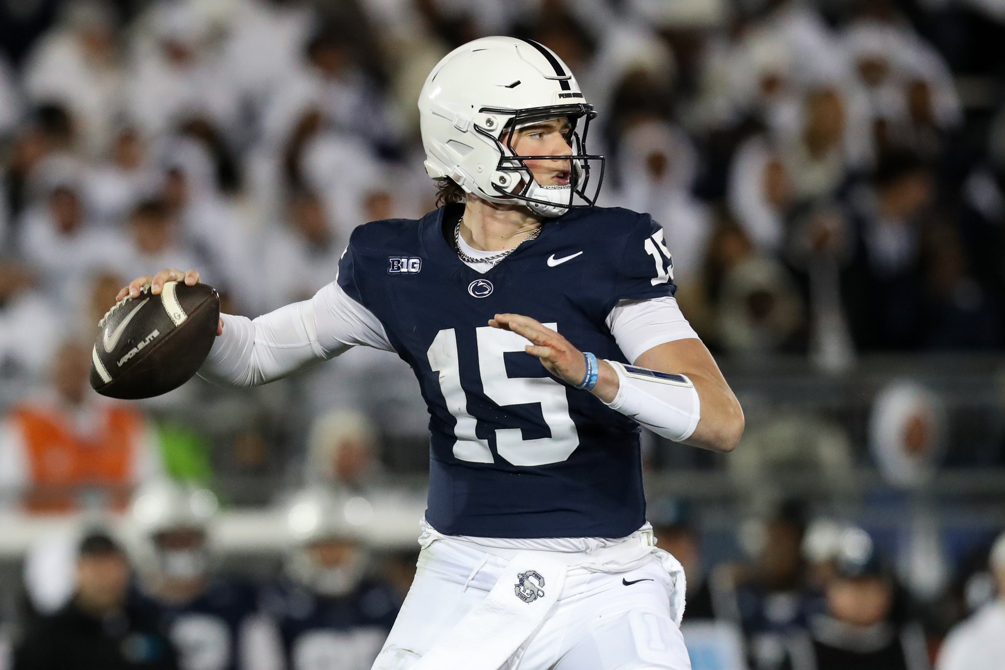 Nov 9, 2024; University Park, Pennsylvania, USA; Penn State Nittany Lions quarterback Drew Allar (15) throws a pass against the Washington Huskies during the fourth quarter at Beaver Stadium. Penn State won 35-6.