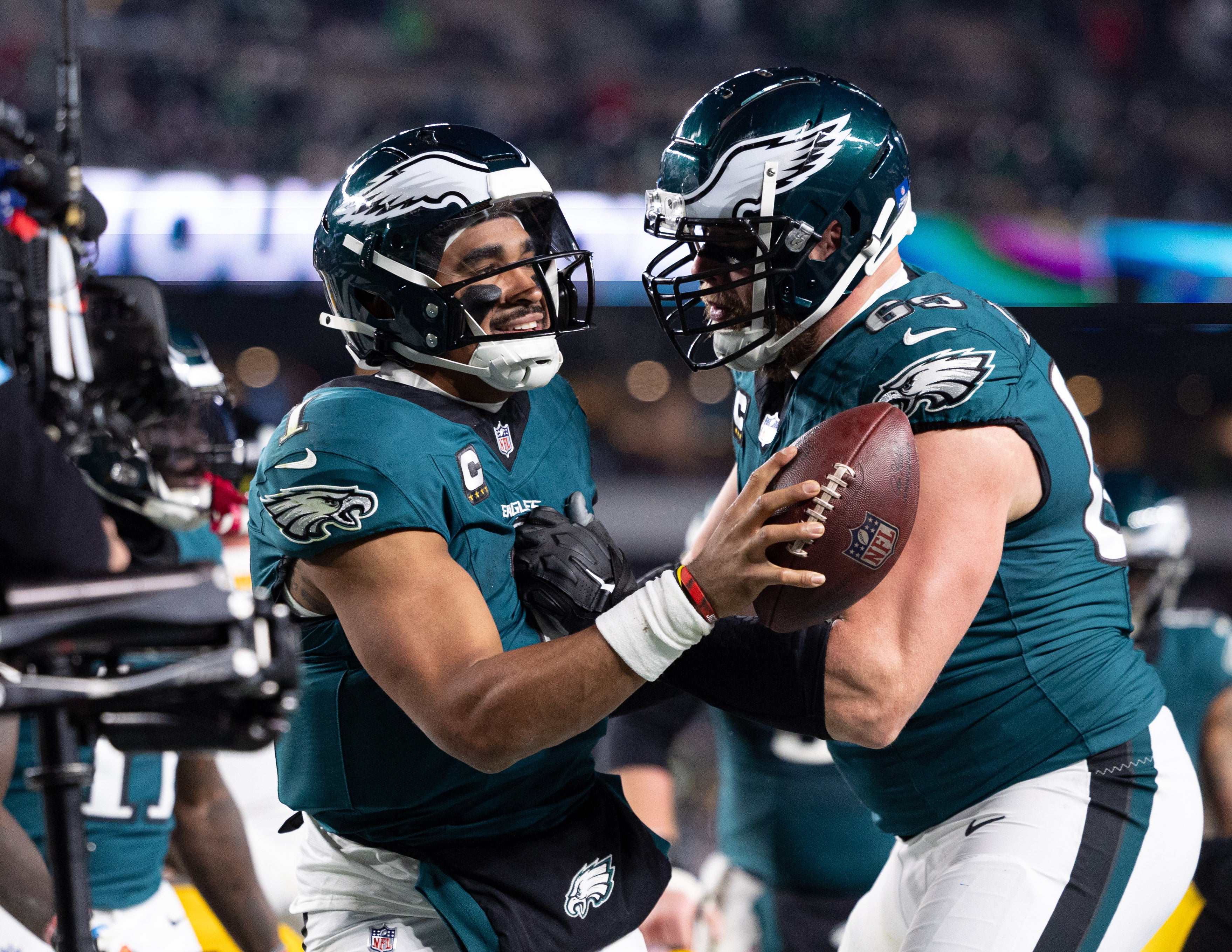 Philadelphia Eagles quarterback Jalen Hurts (1) celebrates with offensive tackle Lane Johnson (65) after his touchdown against the Pittsburgh Steelers during the fourth quarter at Lincoln Financial Field.