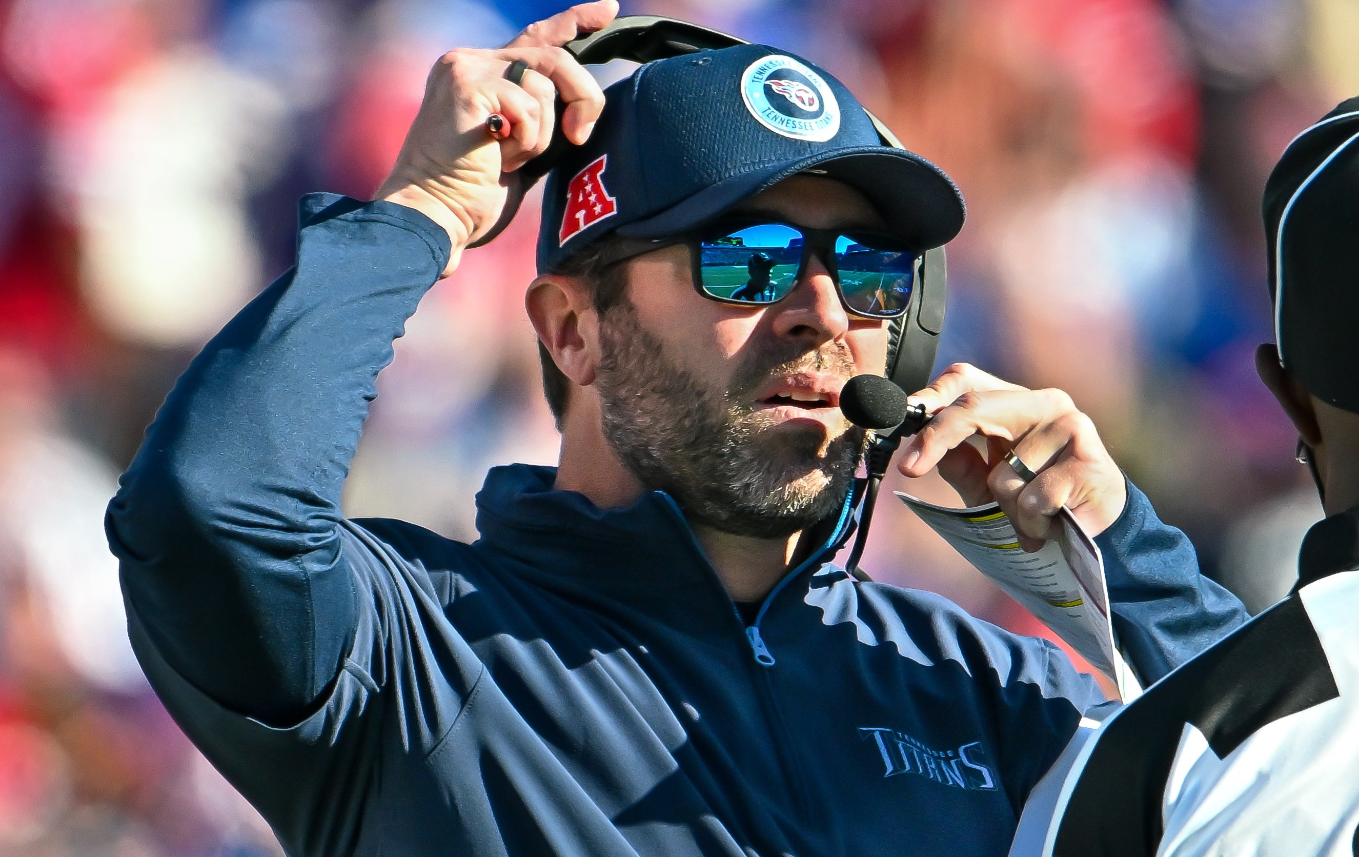 Tennessee Titans head coach Brian Callahan challenges a call in the third quarter against the Buffalo Bills at Highmark Stadium. Mark Konezny-Imagn Images