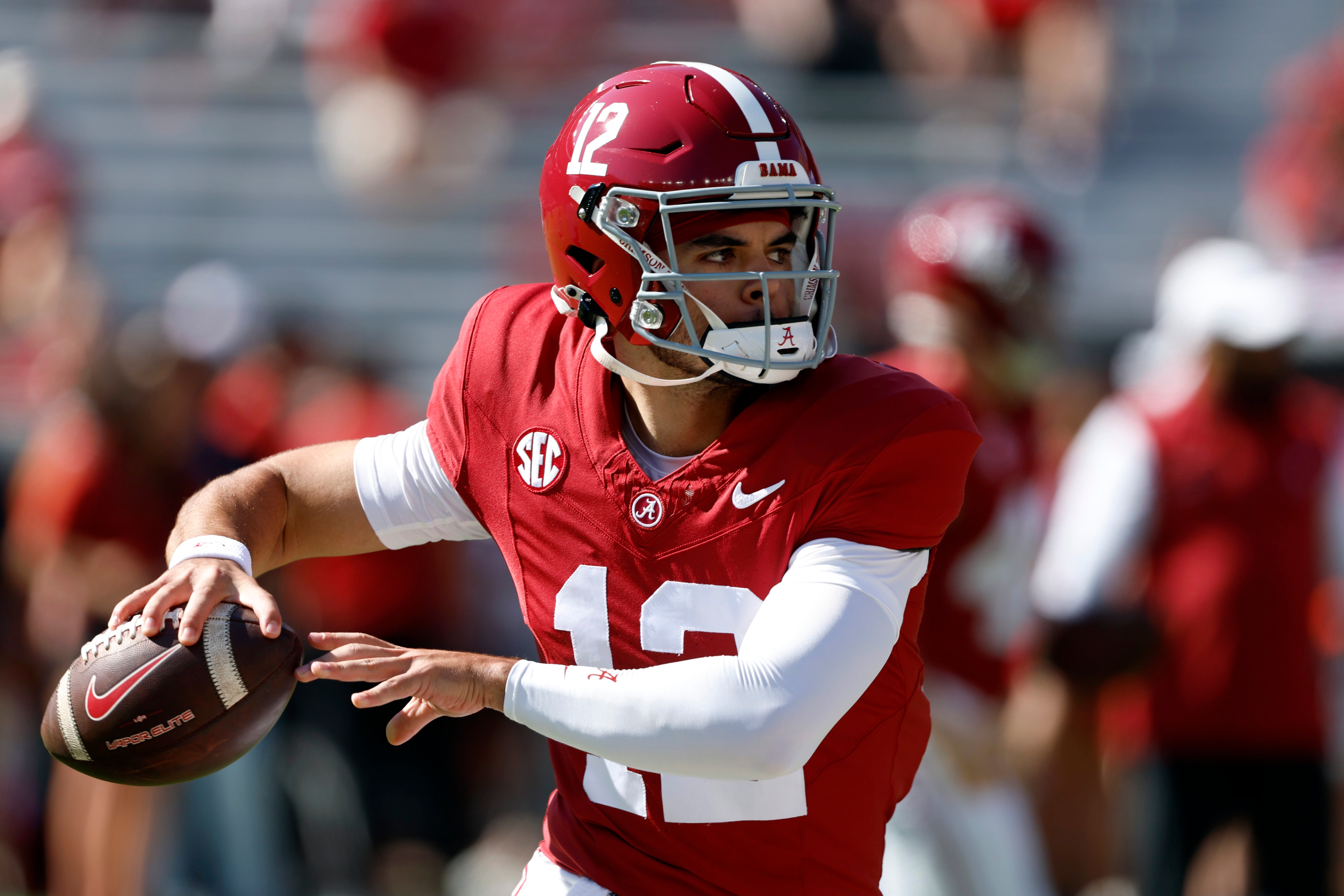 Alabama Crimson Tide quarterback Dylan Lonergan (12) warms up at Bryant-Denny Stadium.
