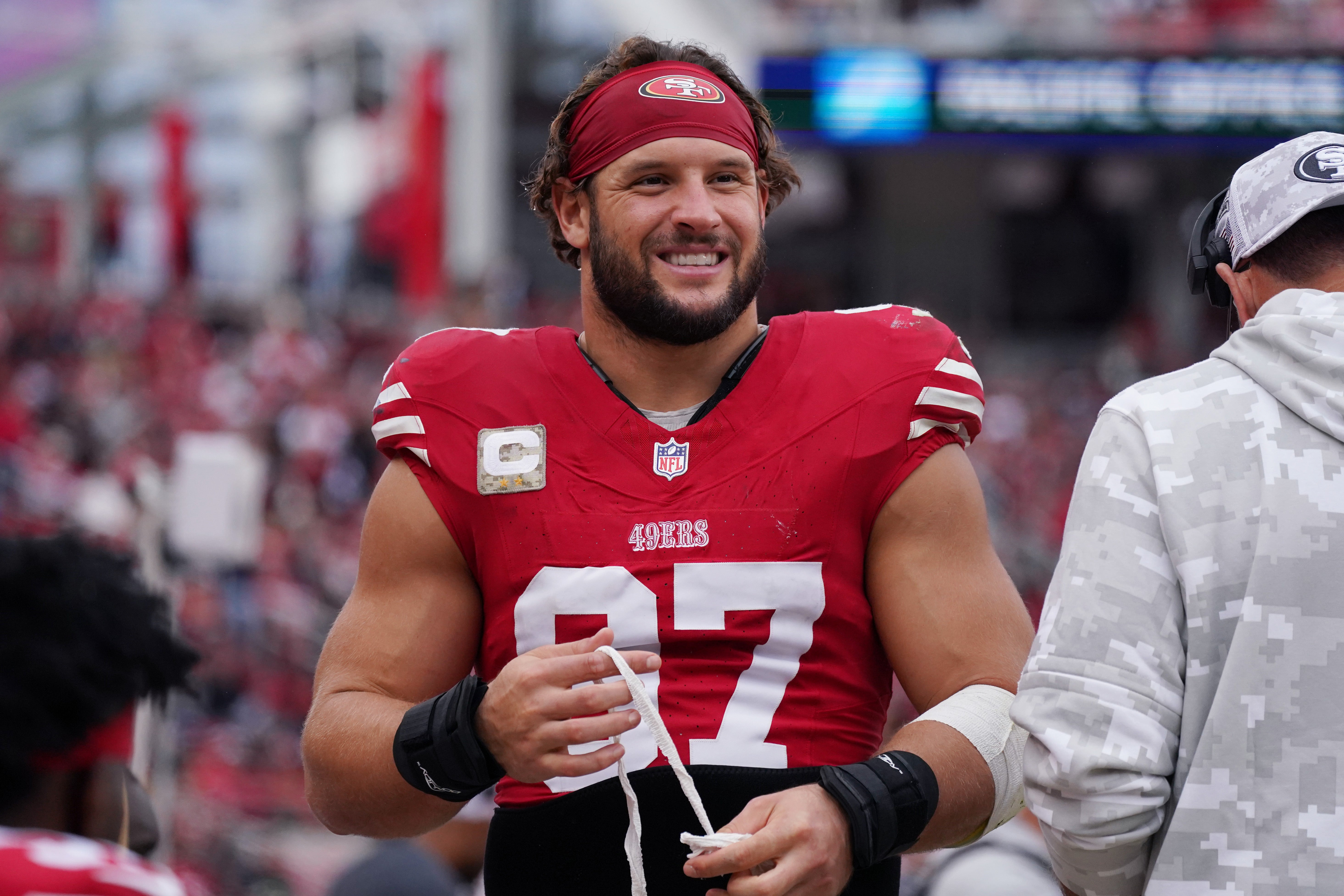 San Francisco 49ers defensive end Nick Bosa (97) waits on the sidelines against the Seattle Seahawks in the third quarter at Levi's Stadium.