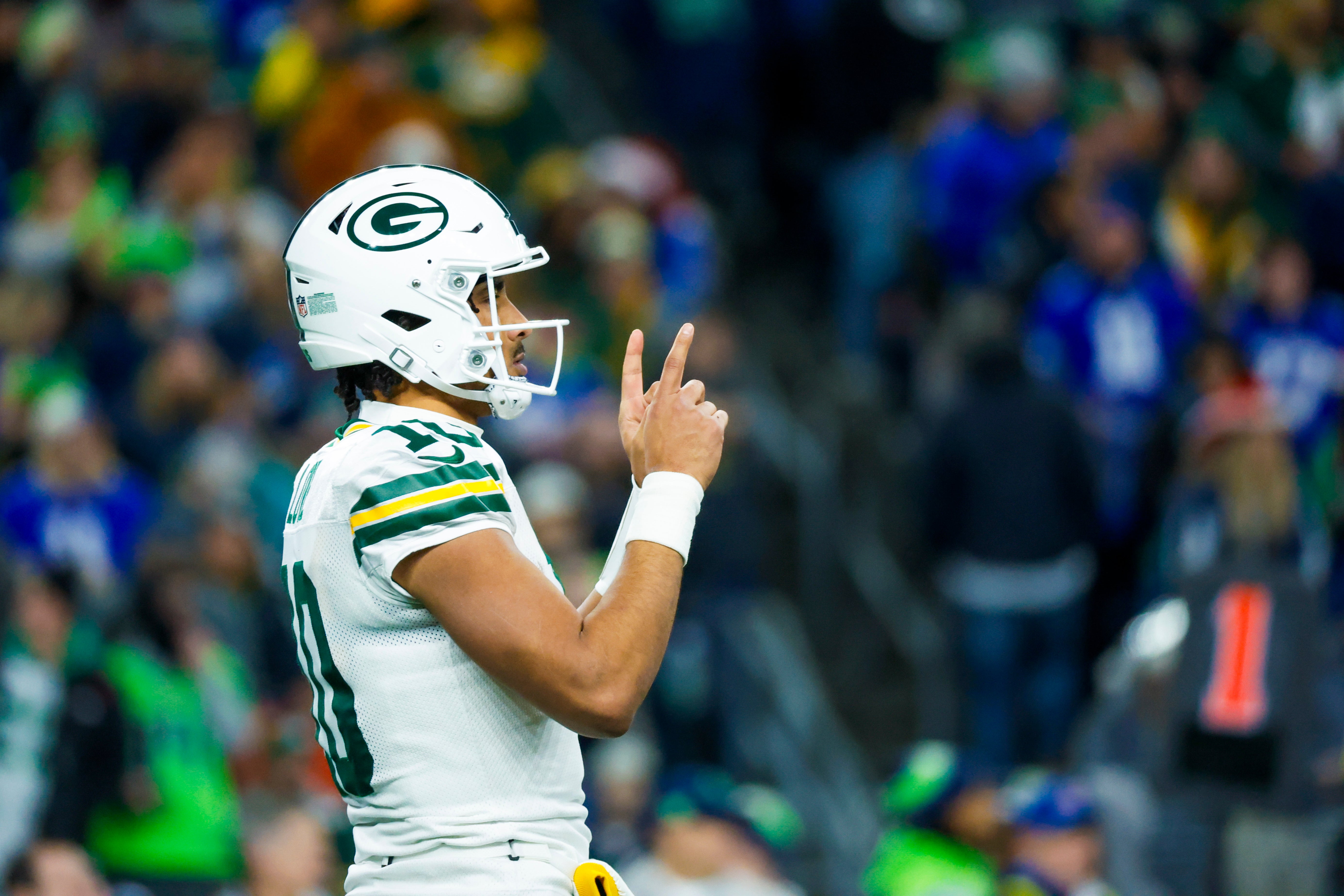 Green Bay Packers quarterback Jordan Love (10) reacts after completing a pass against the Seattle Seahawks during the second quarter at Lumen Field.