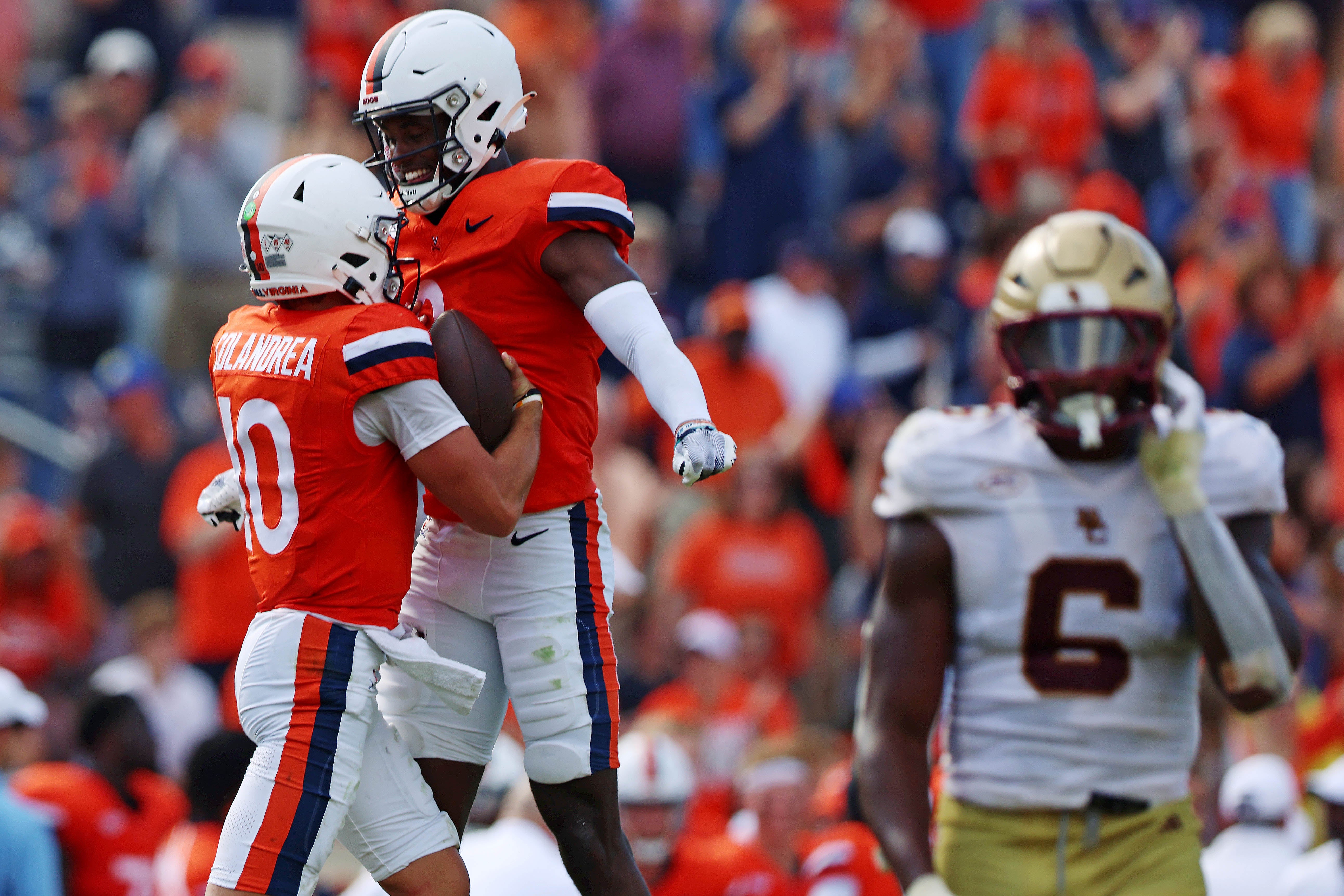 Oct 5, 2024; Charlottesville, Virginia, USA; Virginia Cavaliers quarterback Anthony Colandrea (10) celebrates with wide receiver Malachi Fields (8) after beating Boston College Eagles at Scott Stadium.
