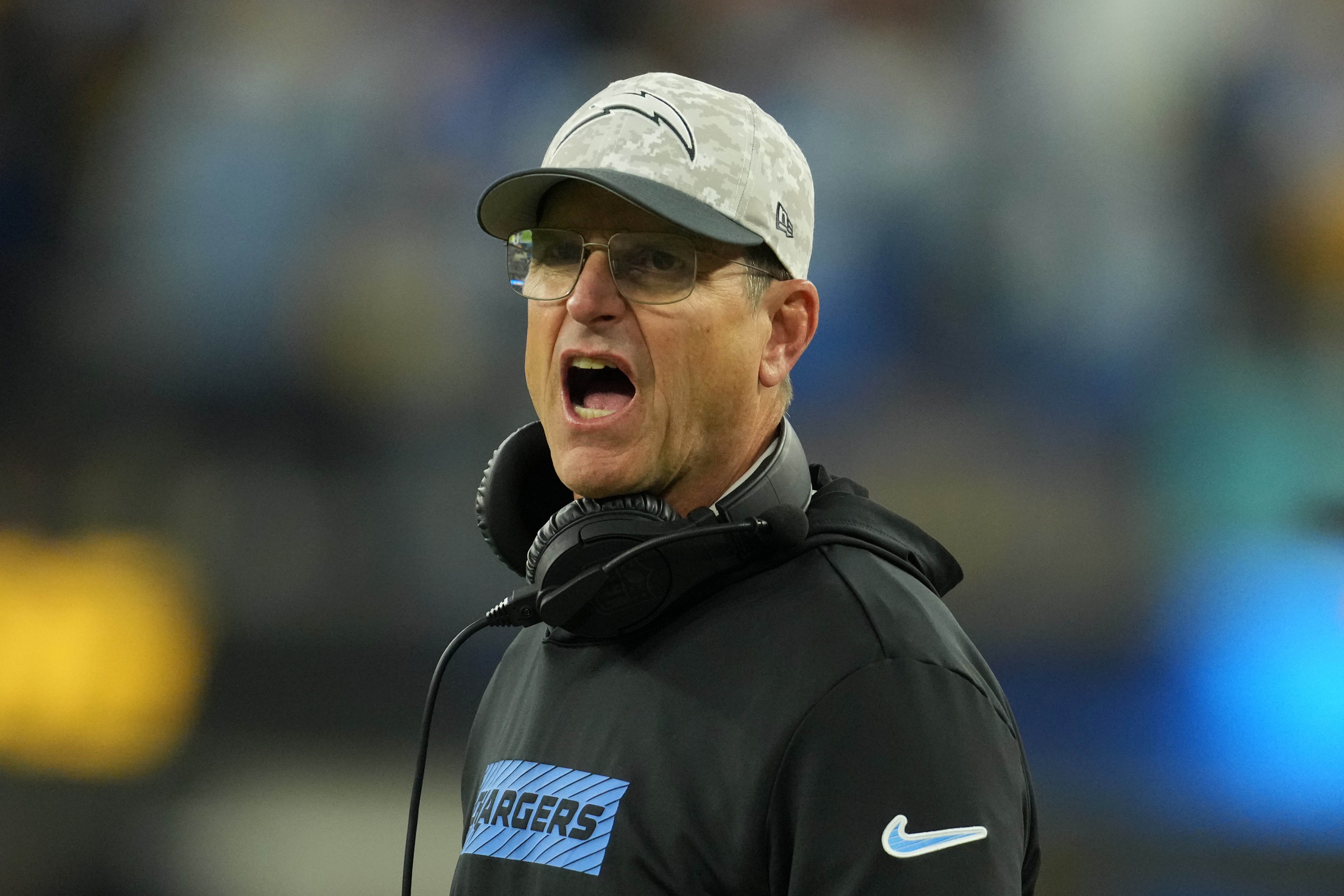 Los Angeles Chargers coach Jim Harbaugh reacts against the Cincinnati Bengals in the second half at SoFi Stadium.