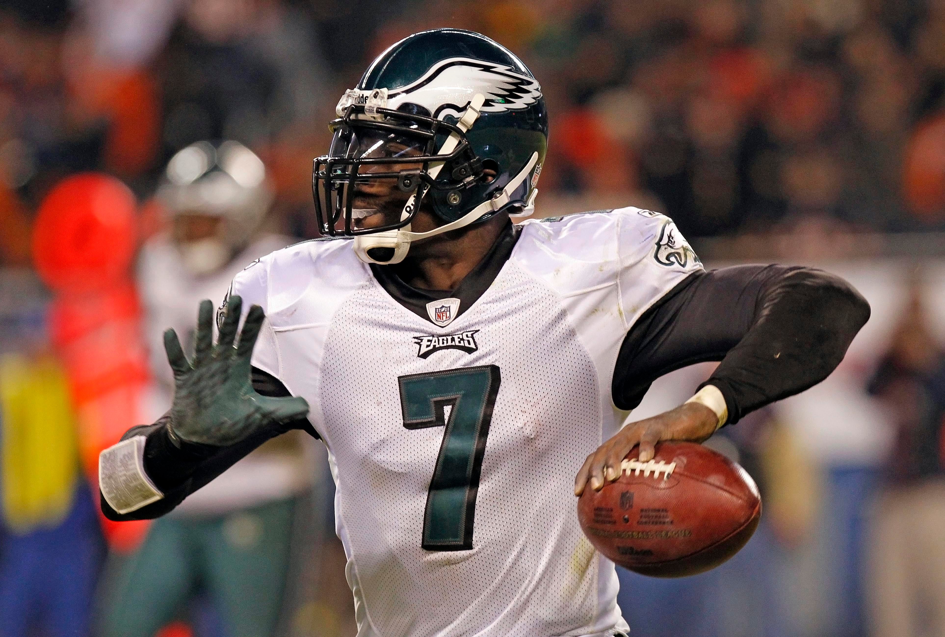 Philadelphia Eagles quarterback Michael Vick (7) drops back to pass against the Chicago Bears during the second half at Soldier Field. The Chicago Bears defeat the Philadelphia Eagles 31-26.
