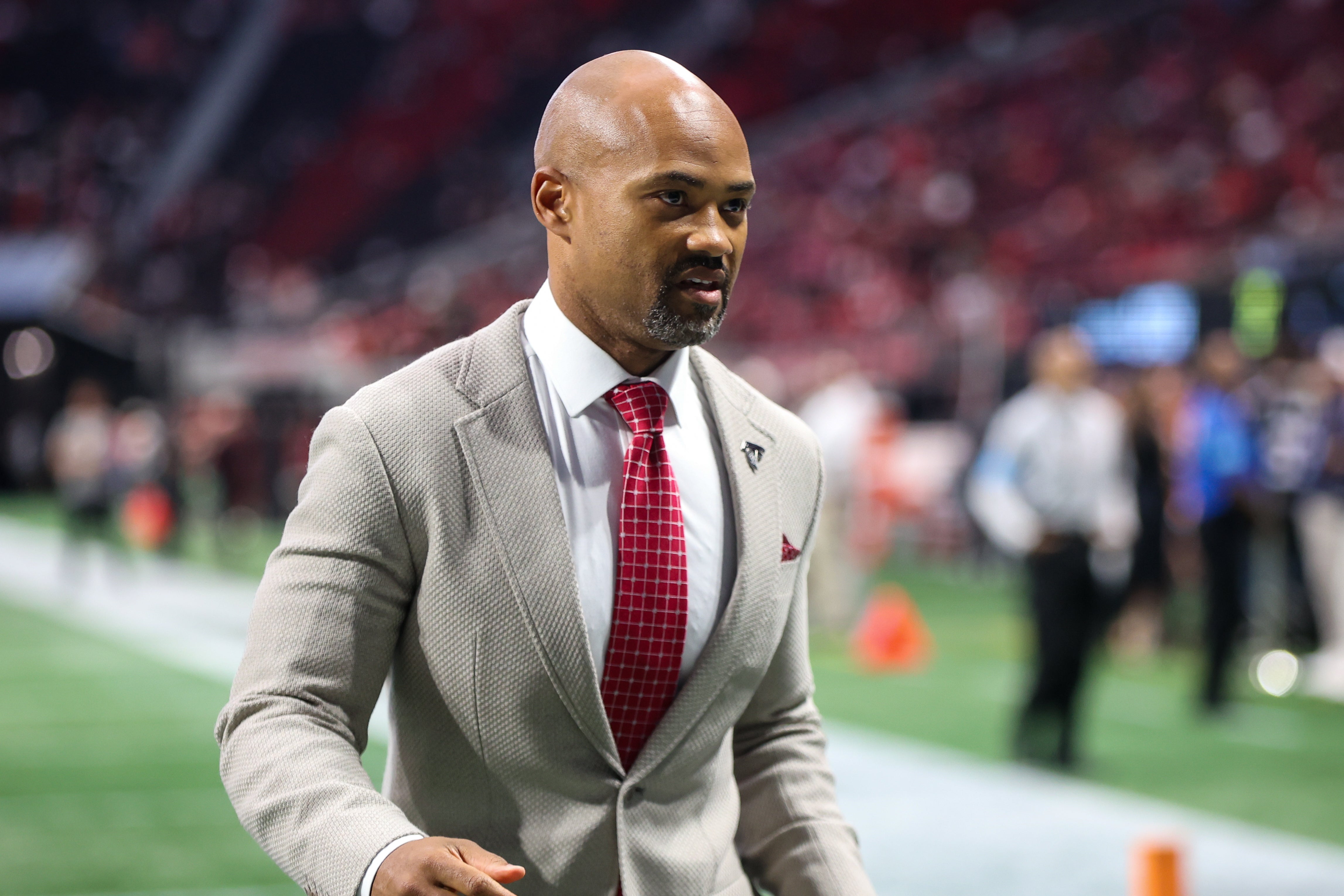 Atlanta Falcons general manager Terry Fontenot on the field before a game against the New Orleans Saints at Mercedes-Benz Stadium.