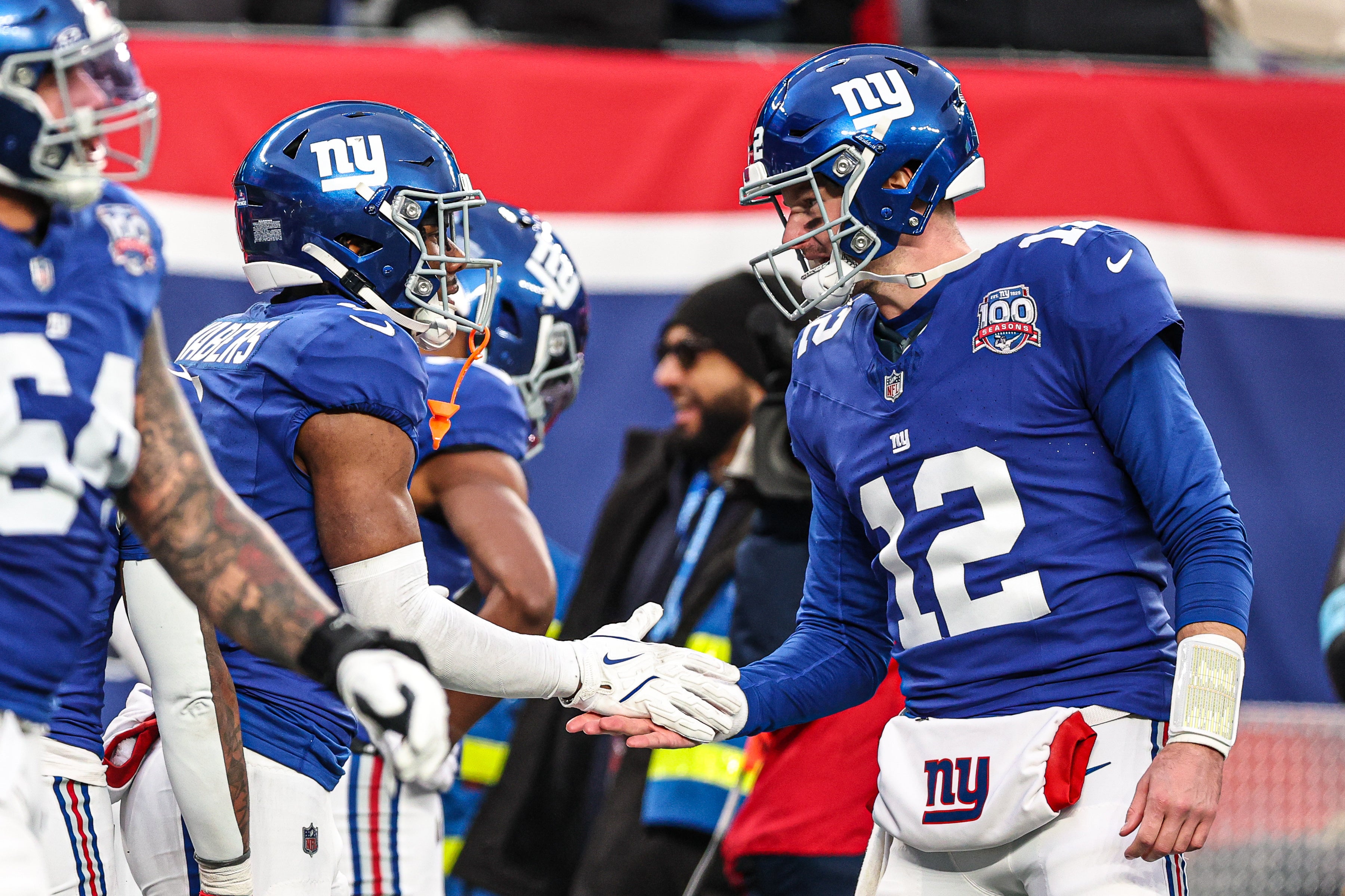 New York Giants wide receiver Malik Nabers (1) celebrates his touchdown reception from quarterback Tim Boyle (12) during the second half against the Baltimore Ravens at MetLife Stadium.