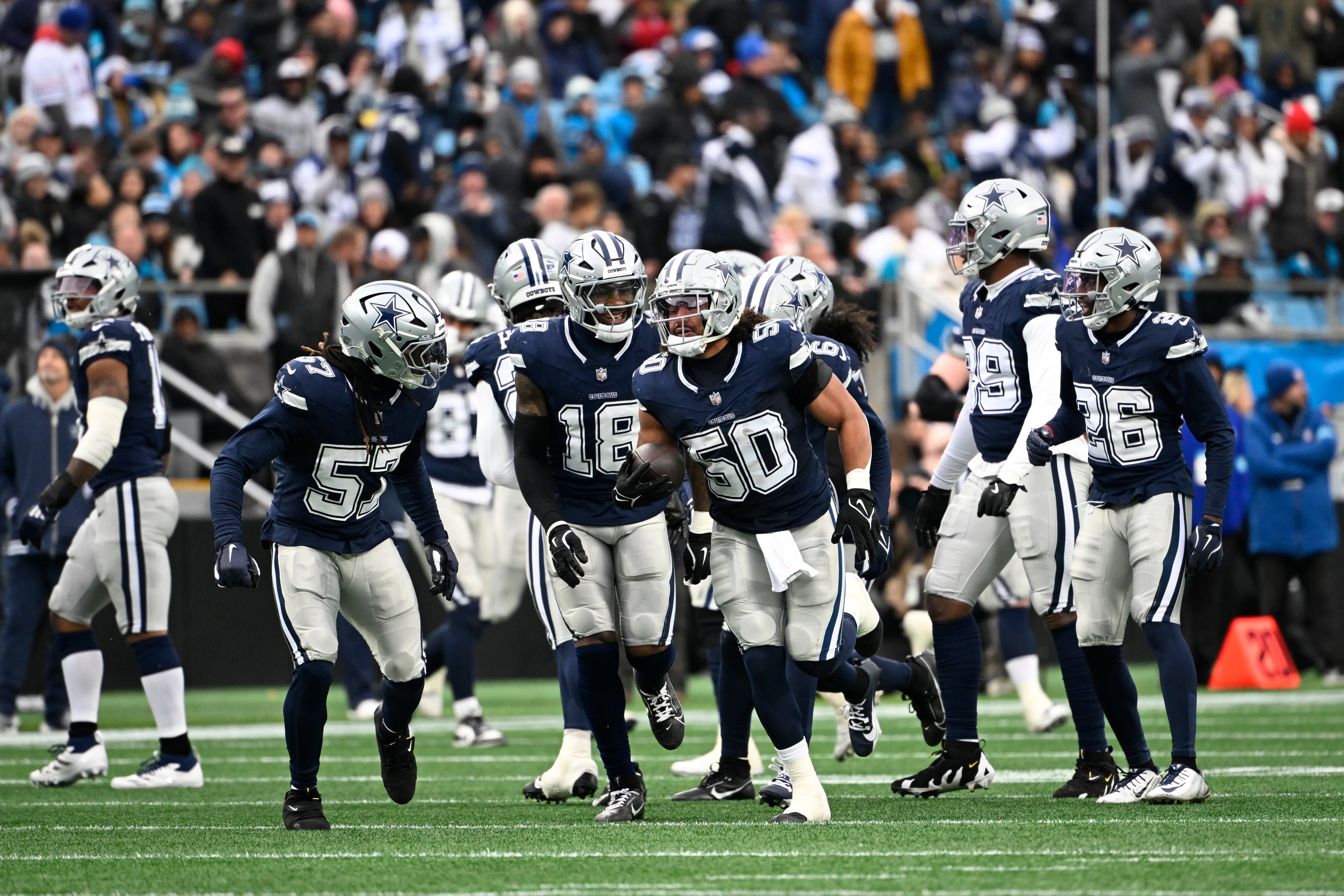 Dallas Cowboys linebacker Eric Kendricks (50) reacts after making an interception in the second quarter at Bank of America Stadium.