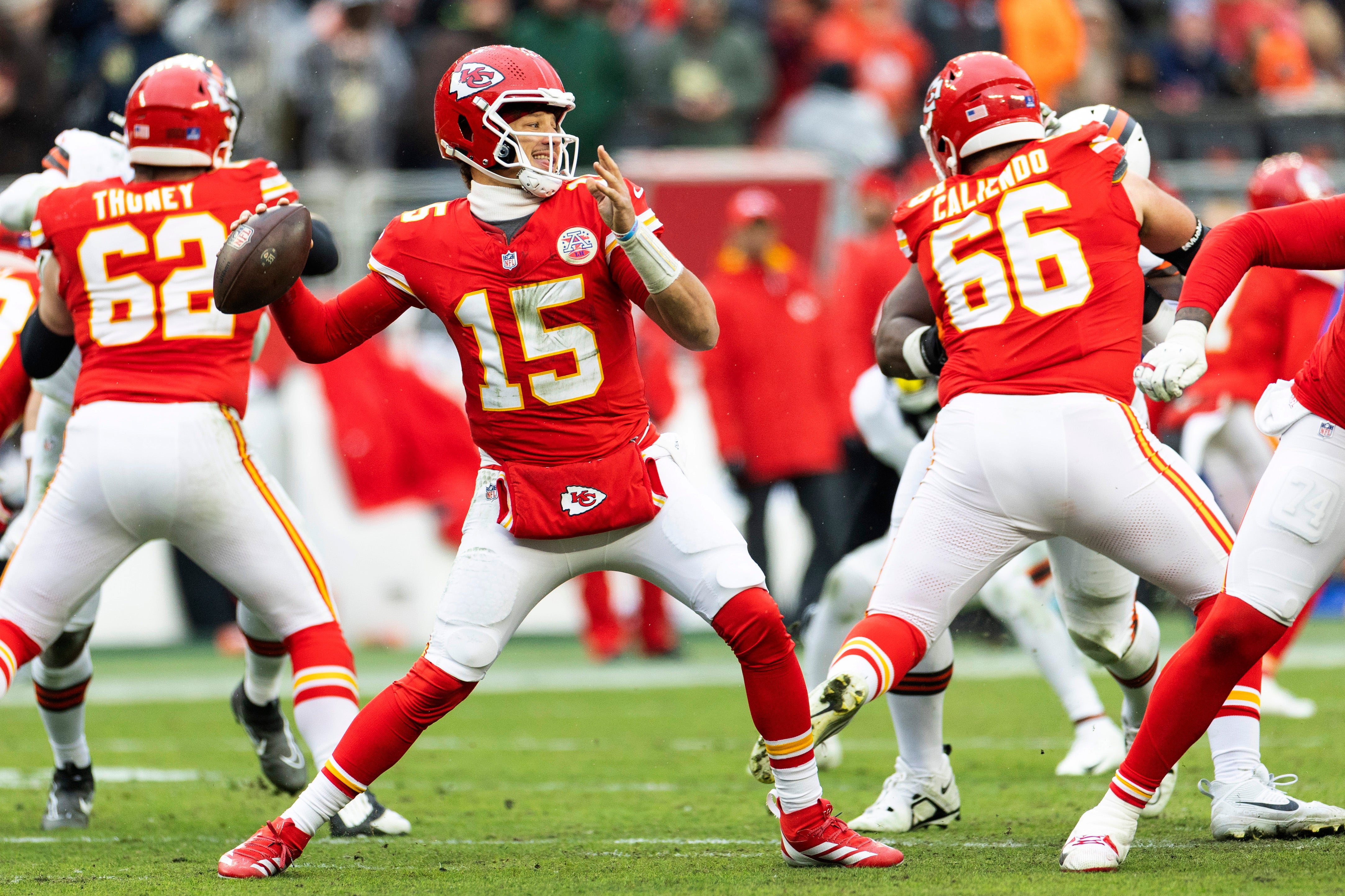 Dec 15, 2024; Cleveland, Ohio, USA; Kansas City Chiefs quarterback Patrick Mahomes (15) throws against the Cleveland Browns during the second quarter at Huntington Bank Field.