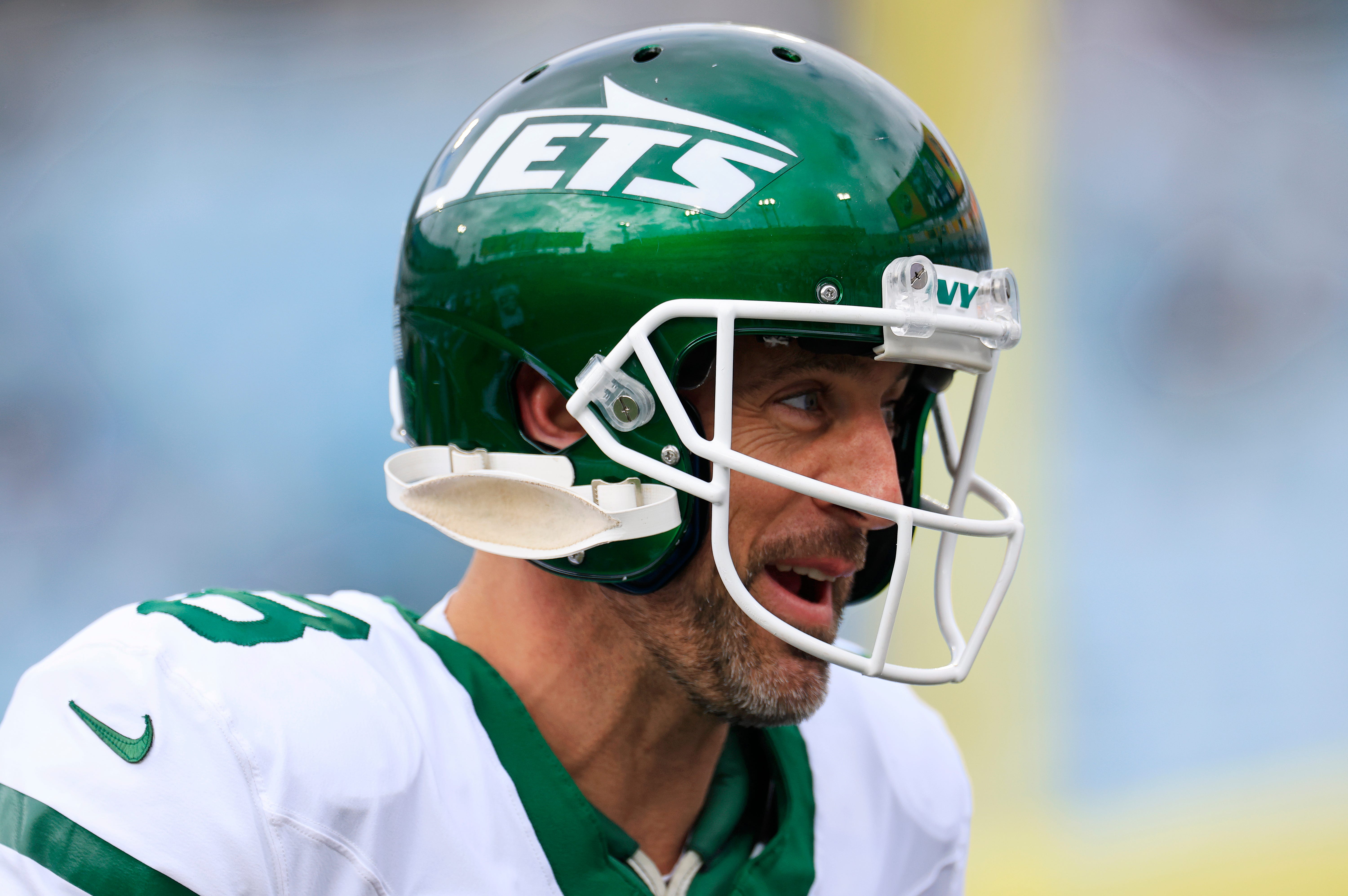 New York Jets quarterback Aaron Rodgers (8) looks on before an NFL football matchup Sunday, Dec. 15, 2024 at EverBank Stadium in Jacksonville, Fla. 