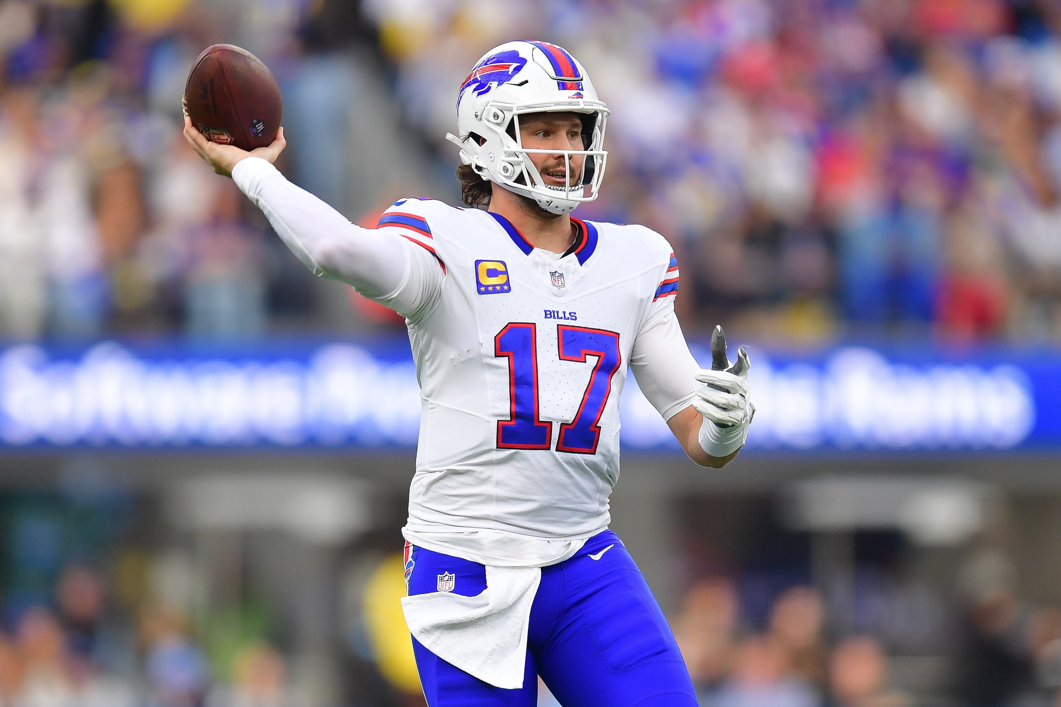 Dec 8, 2024; Inglewood, California, USA; Buffalo Bills quarterback Josh Allen (17) throws against the Los Angeles Rams during the first half at SoFi Stadium.