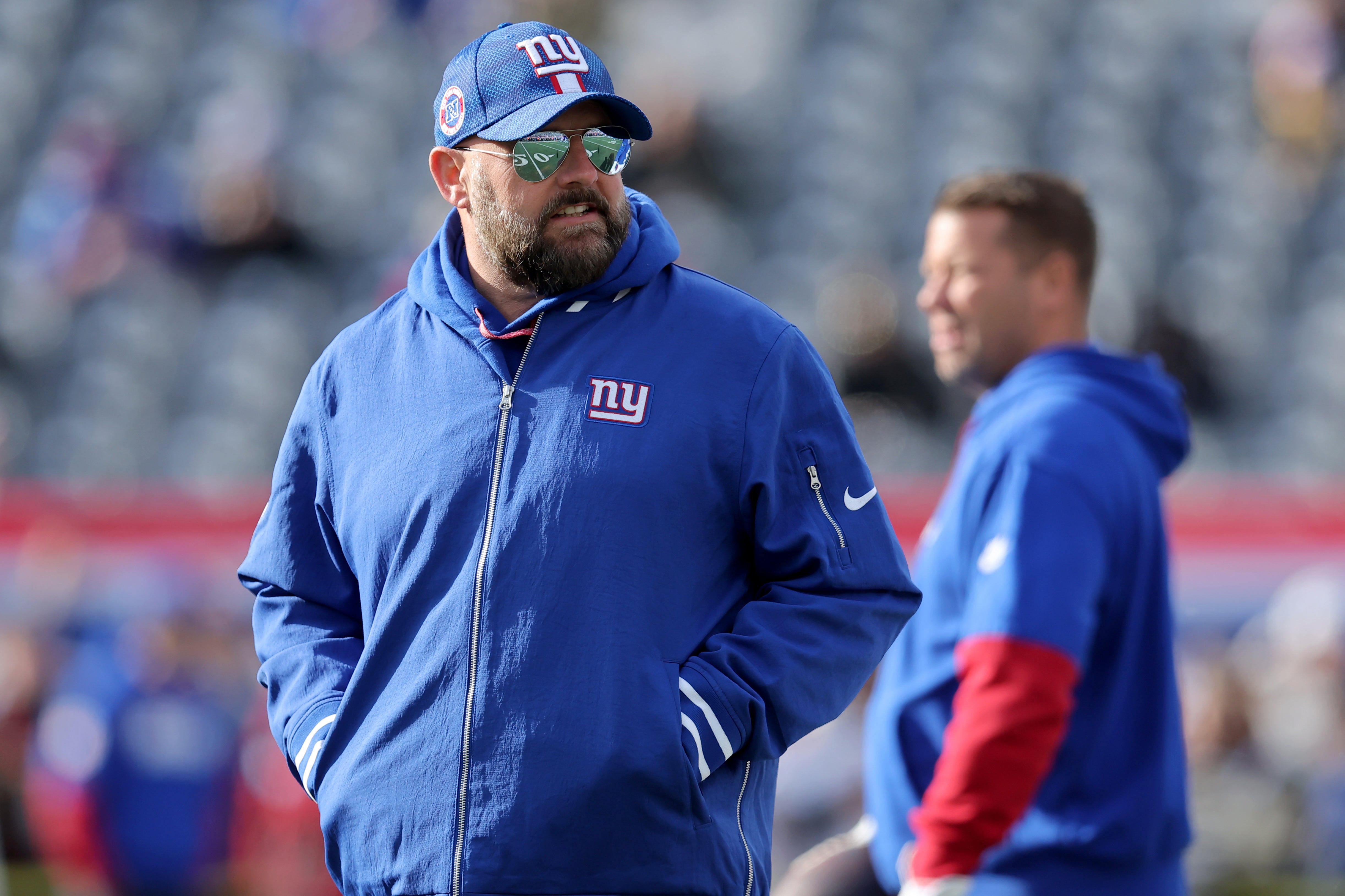 Dec 8, 2024; East Rutherford, New Jersey, USA; New York Giants head coach Brian Daboll watches warmups before a game against the New Orleans Saints at MetLife Stadium.
