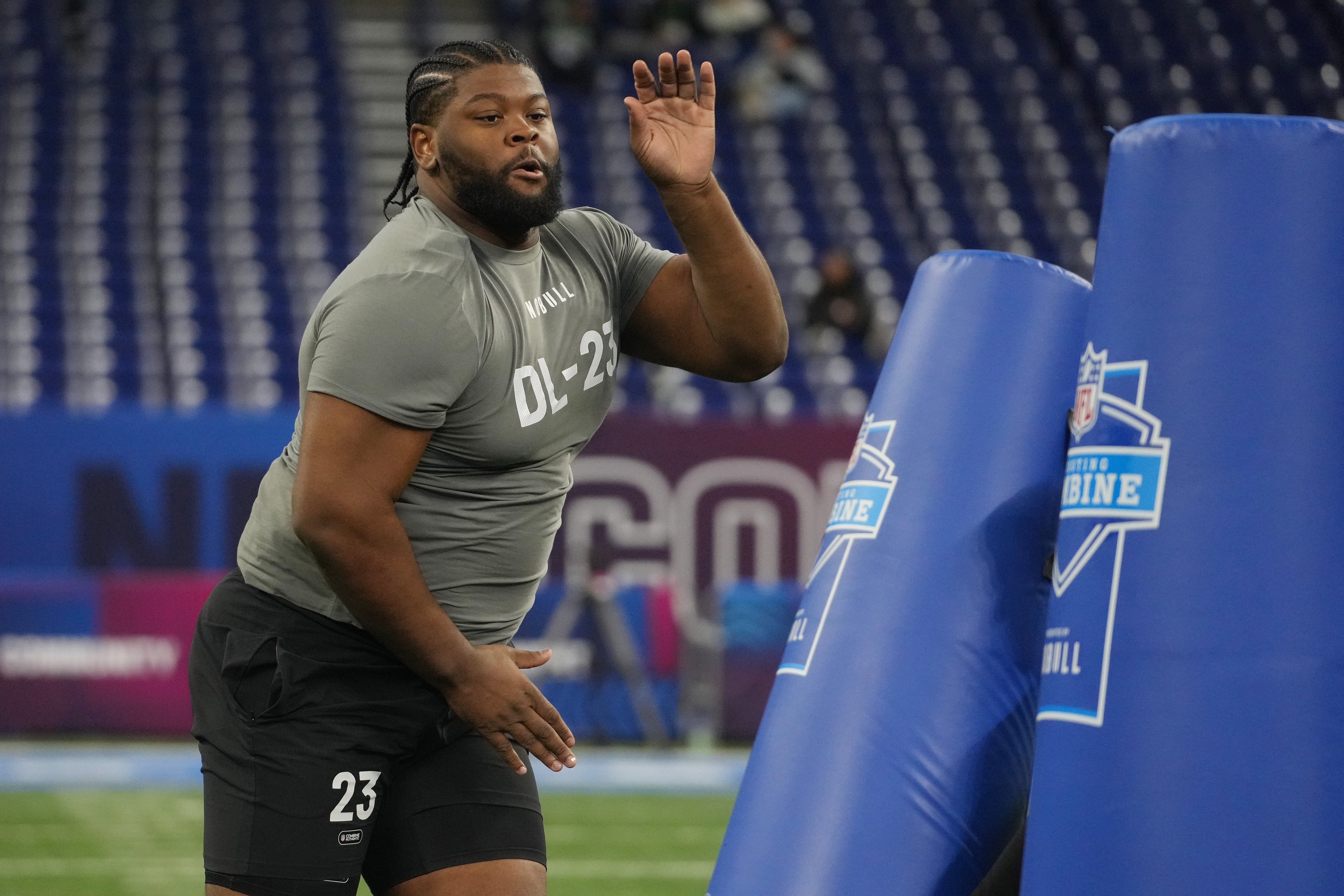Feb 29, 2024; Indianapolis, IN, USA; Auburn defensive lineman Justin Rogers (DL23) works out during the 2024 NFL Combine at Lucas Oil Stadium.