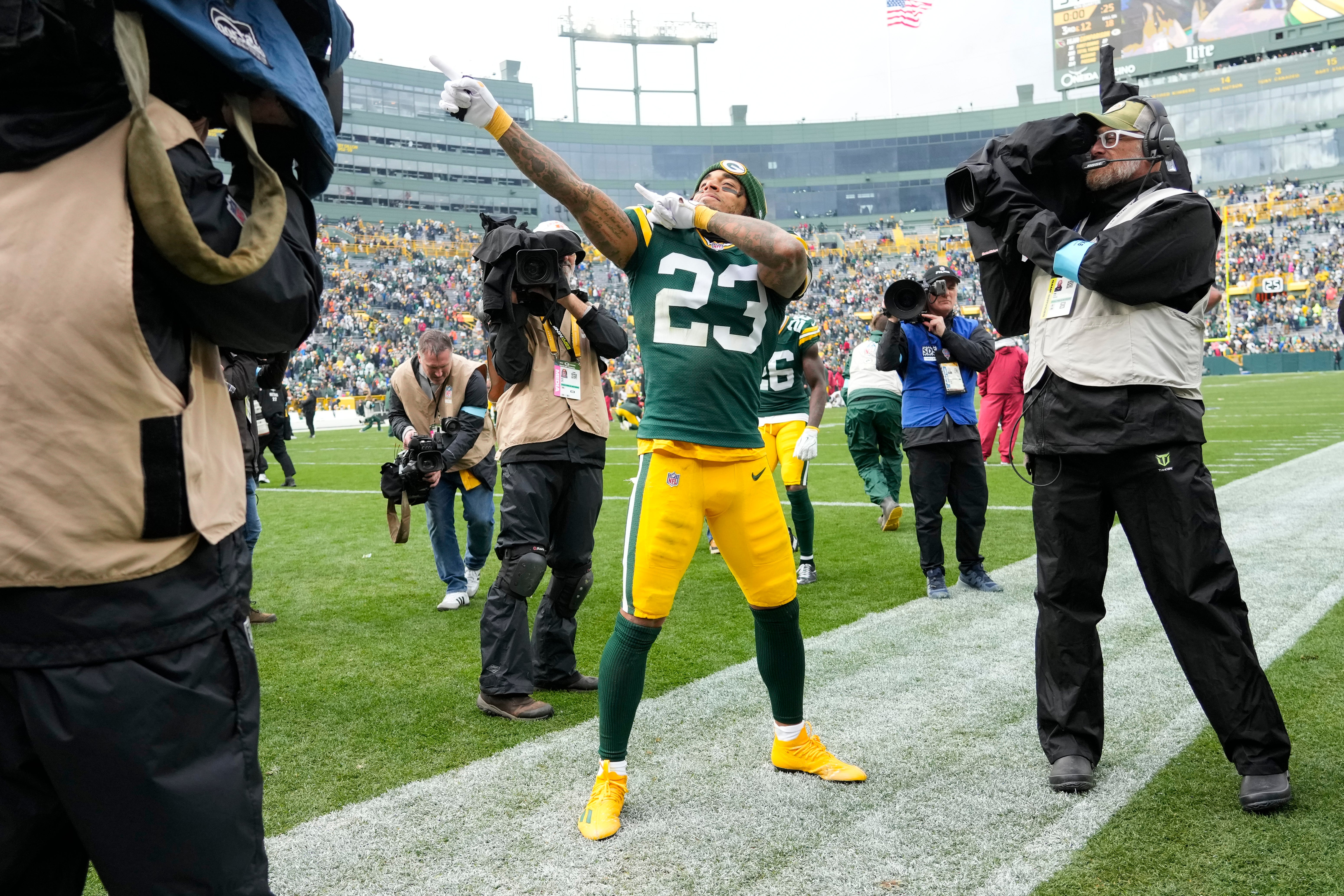 Green Bay Packers cornerback Jaire Alexander (23) celebrates following the game against the Arizona Cardinals at Lambeau Field.