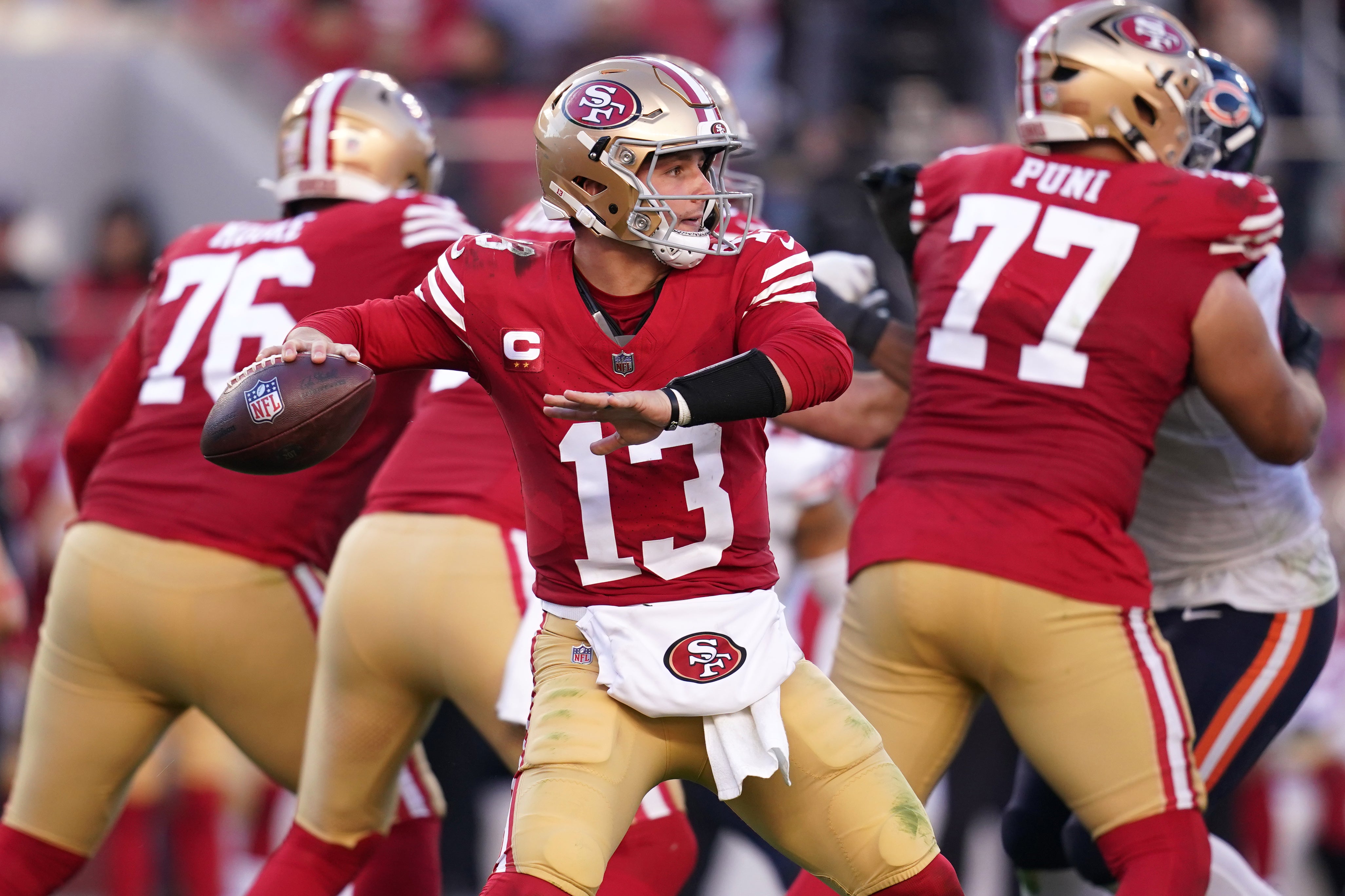 Dec 8, 2024; Santa Clara, California, USA; San Francisco 49ers quarterback Brock Purdy (13) throws a pass against the Chicago Bears in the third quarter at Levi's Stadium.
