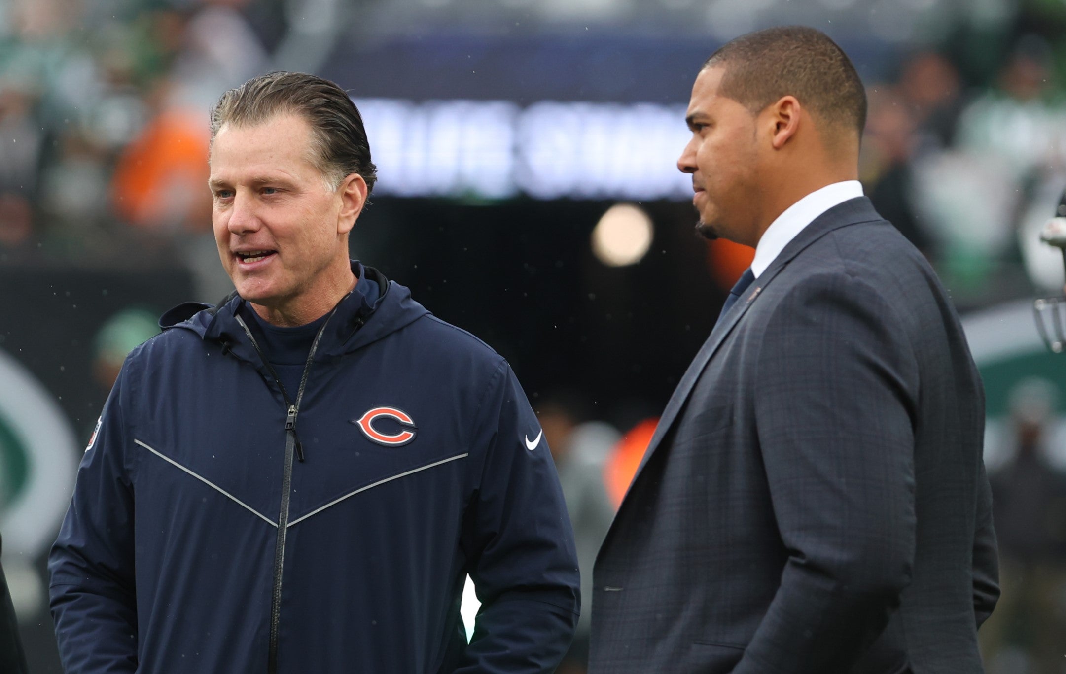 Nov 27, 2022; East Rutherford, New Jersey, USA; New York Jets head coach Robert Saleh (left) speaks with Chicago Bears head coach Matt Eberflus (center) and general manager Ryan Poles during pregame warmups at MetLife Stadium.