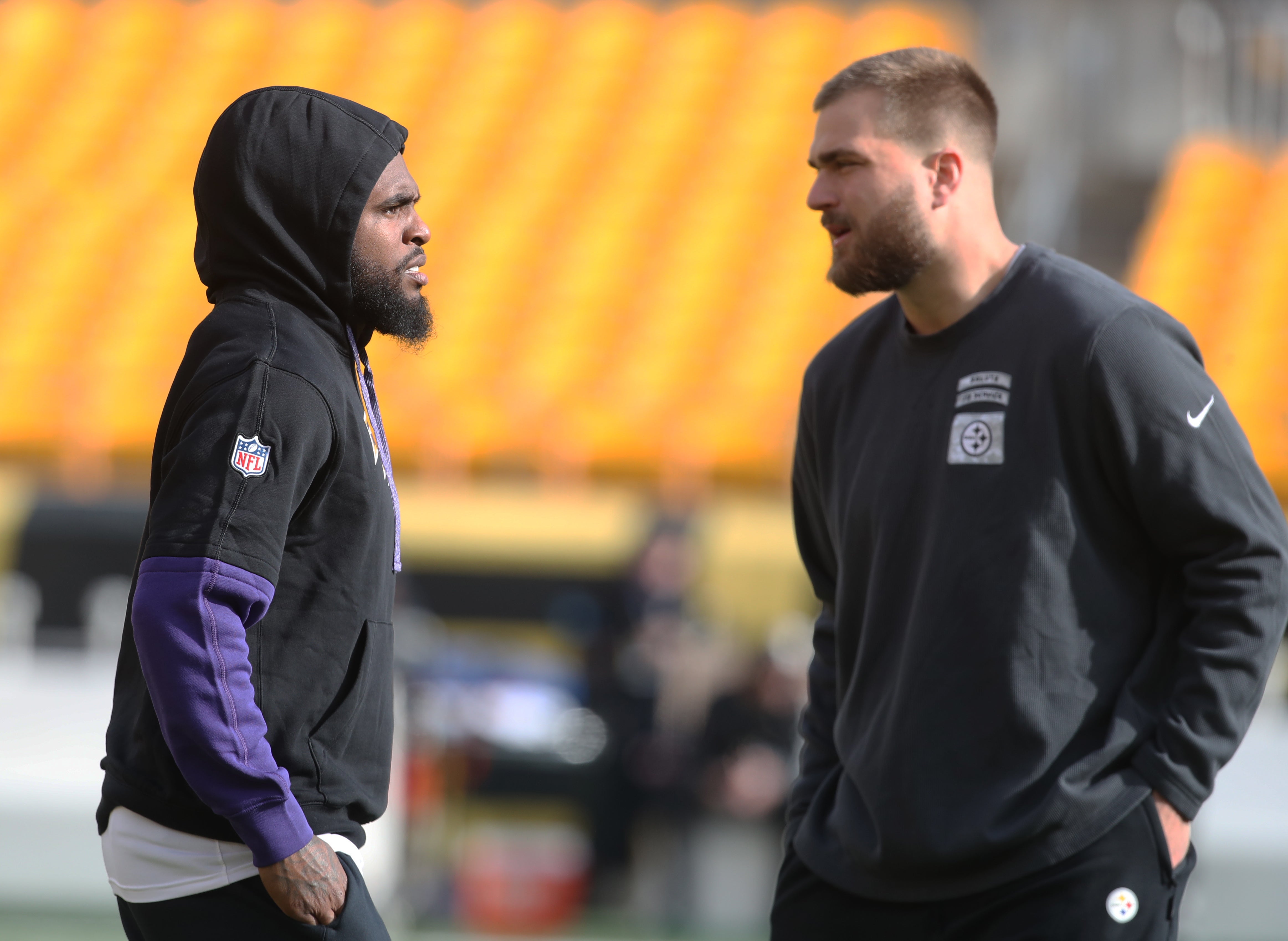 Nov 17, 2024; Pittsburgh, Pennsylvania, USA; Baltimore Ravens wide receiver Diontae Johnson (left) and Pittsburgh Steelers tight end Pat Freiermuth (right) talk on the field before their game at Acrisure Stadium.