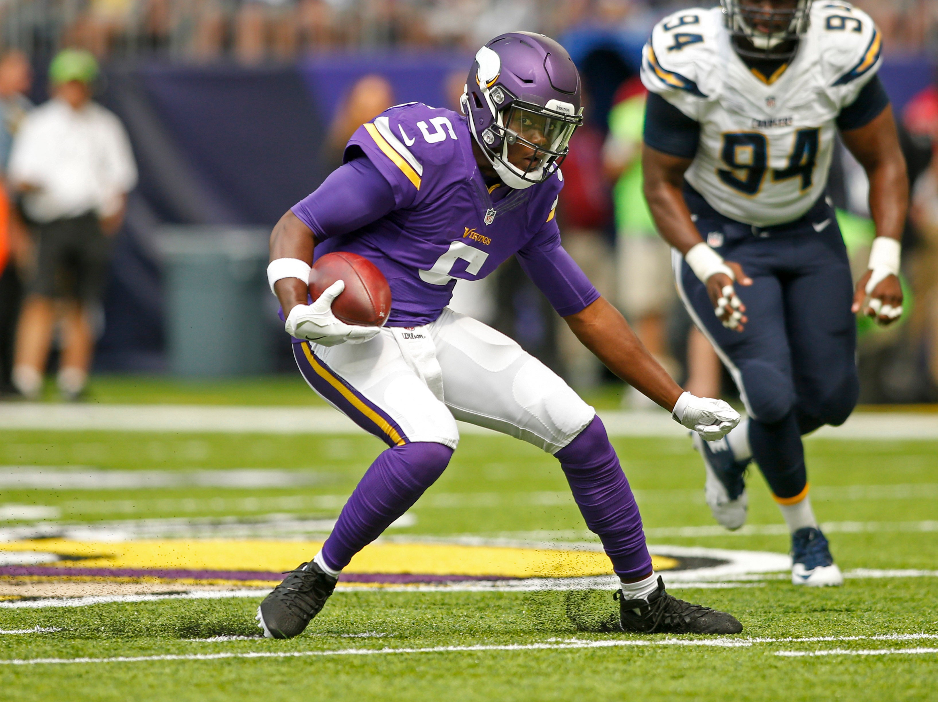 Aug 28, 2016; Minneapolis, MN, USA; Minnesota Vikings quarterback Teddy Bridgewater (5) scrambles against the San Diego Chargers in the first quarter at U.S. Bank Stadium. The Vikings won 23-10.