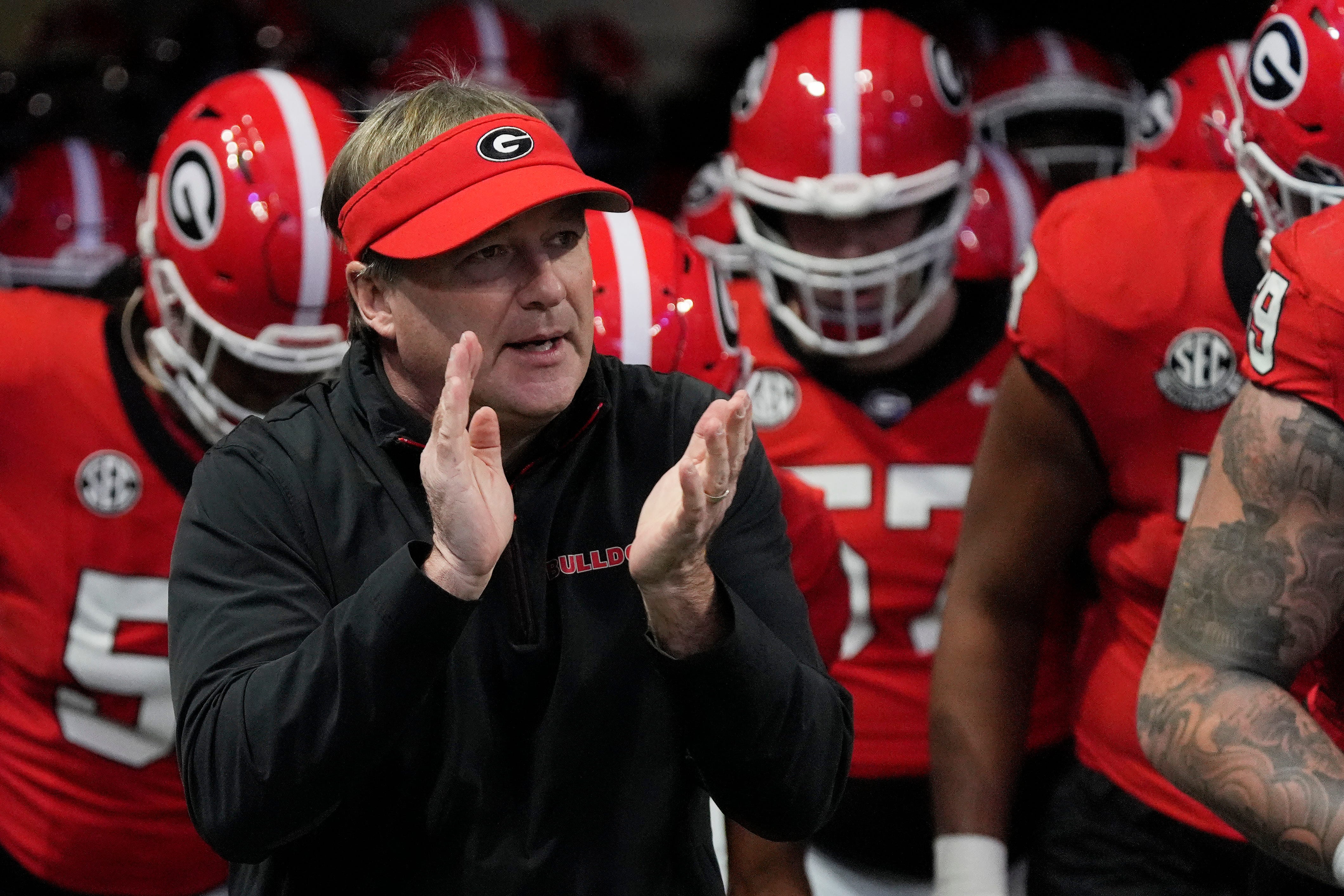 Georgia coach Kirby Smart takes the field with his team before the start of the SEC championship game against Texas in Atlanta, on Saturday, Dec. 7, 2024
